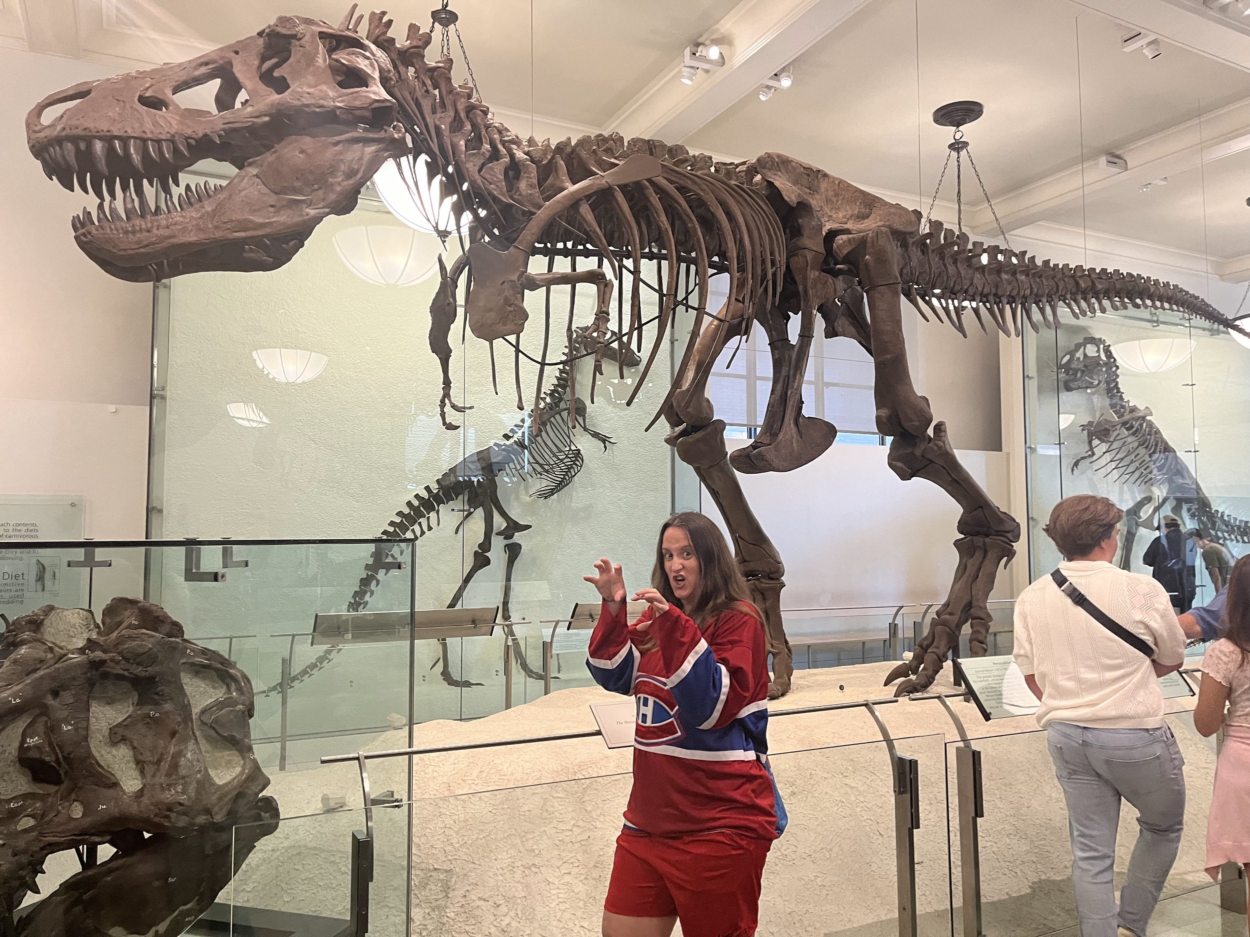 Posing in front of a Tyrannosaurus rex skeleton at the American Museum of Natural History in New York City.