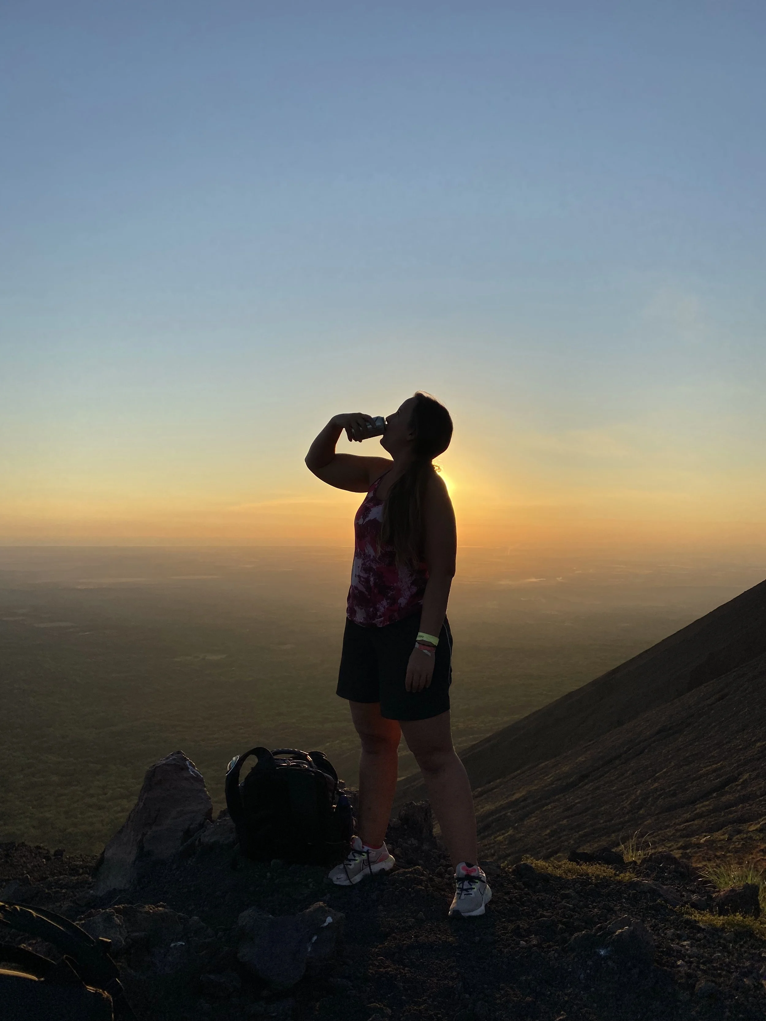 Watching sunset on Telica volcano in Nicaragua with scenic views and beer