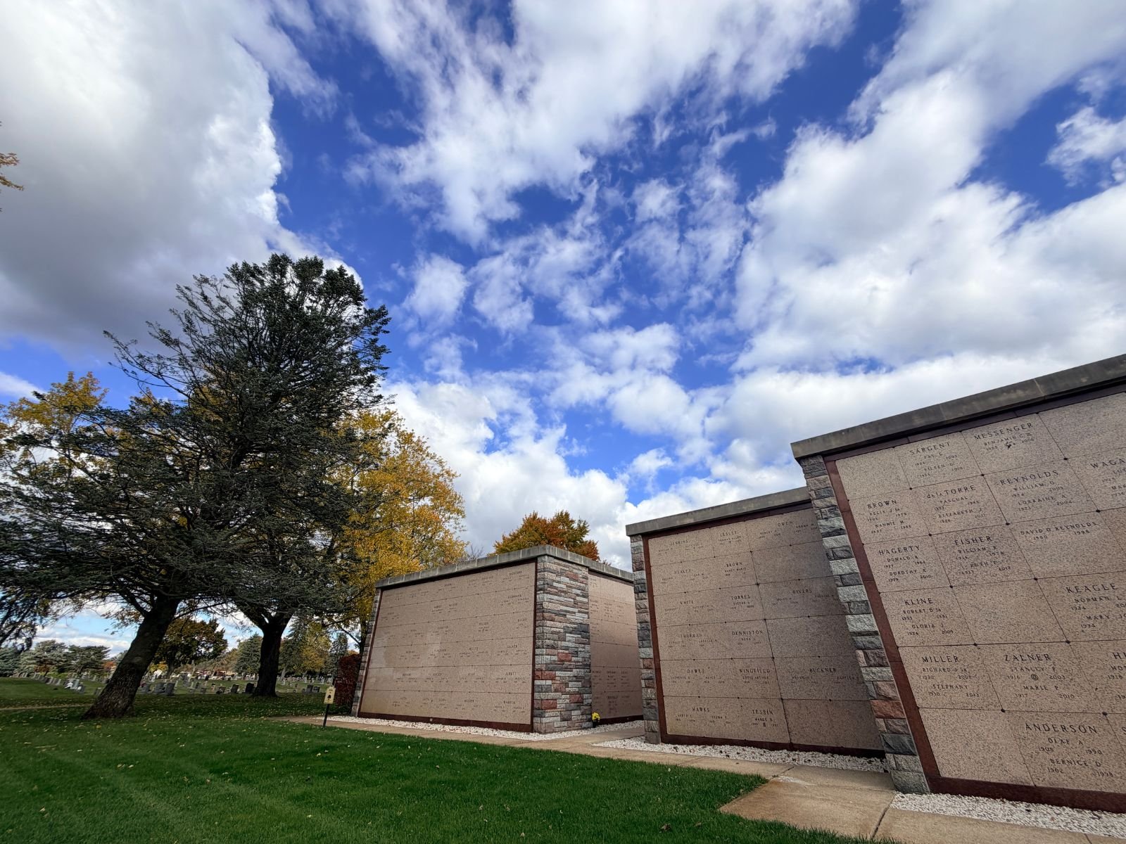 Memorial walls with engraved names at the cemetery