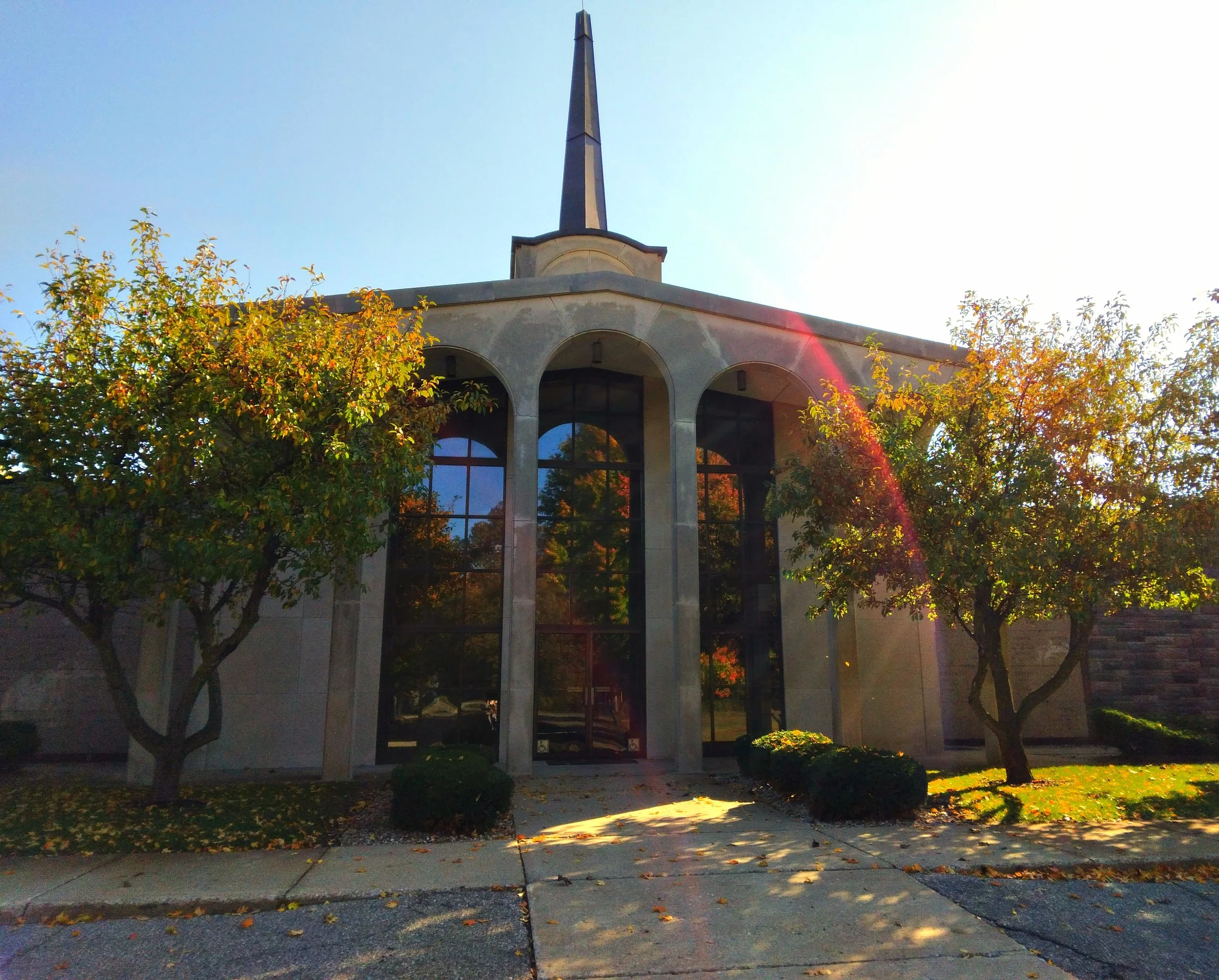 Chapel at Battle Creek Memorial Park surrounded by fall trees