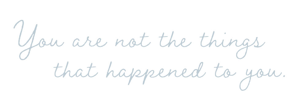 Inspirational quote on black background: "You are not the things that happened to you" in light blue cursive font.