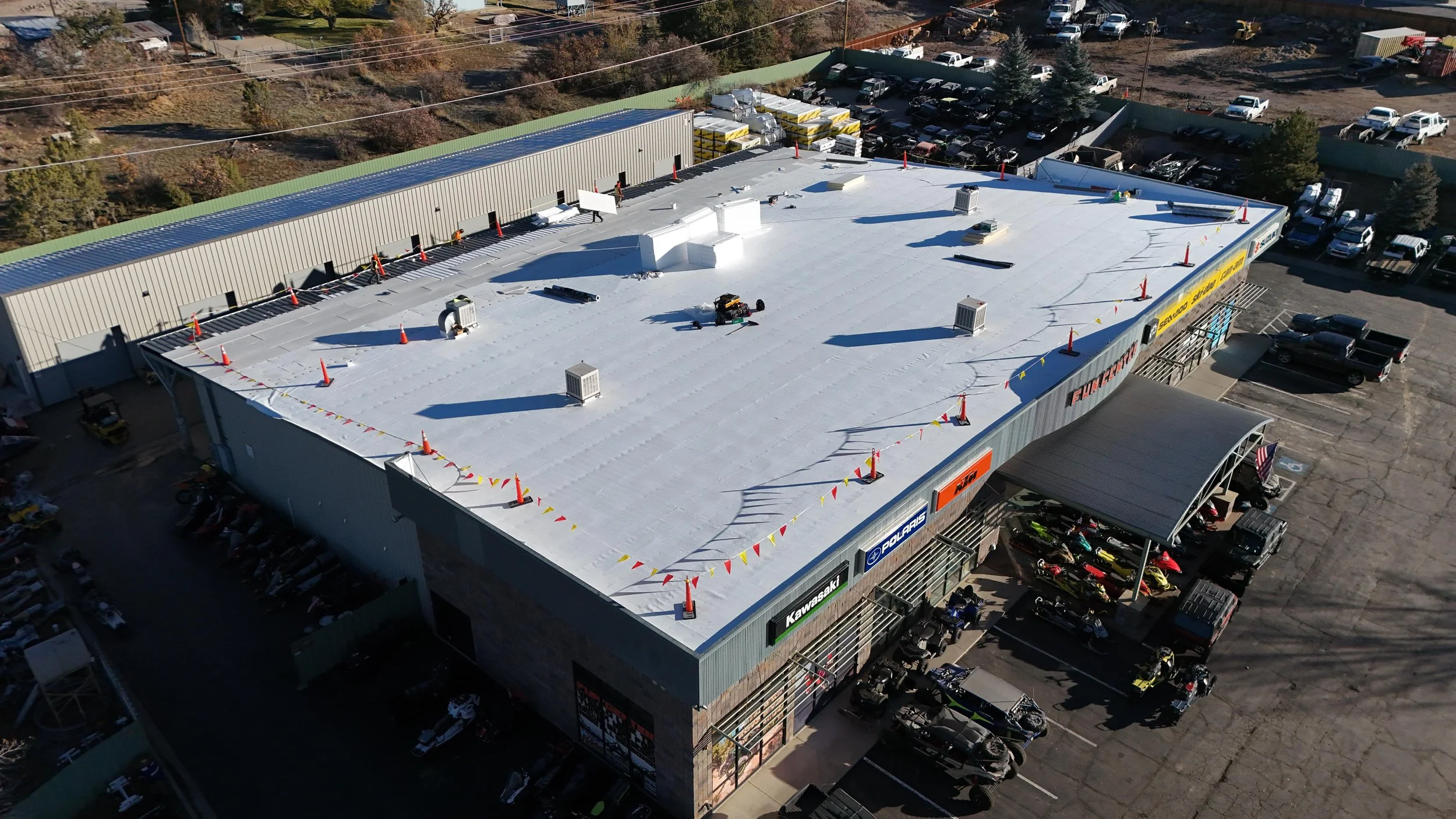 Commercial roofing system on a South Florida property serviced by SpearTip Roofing