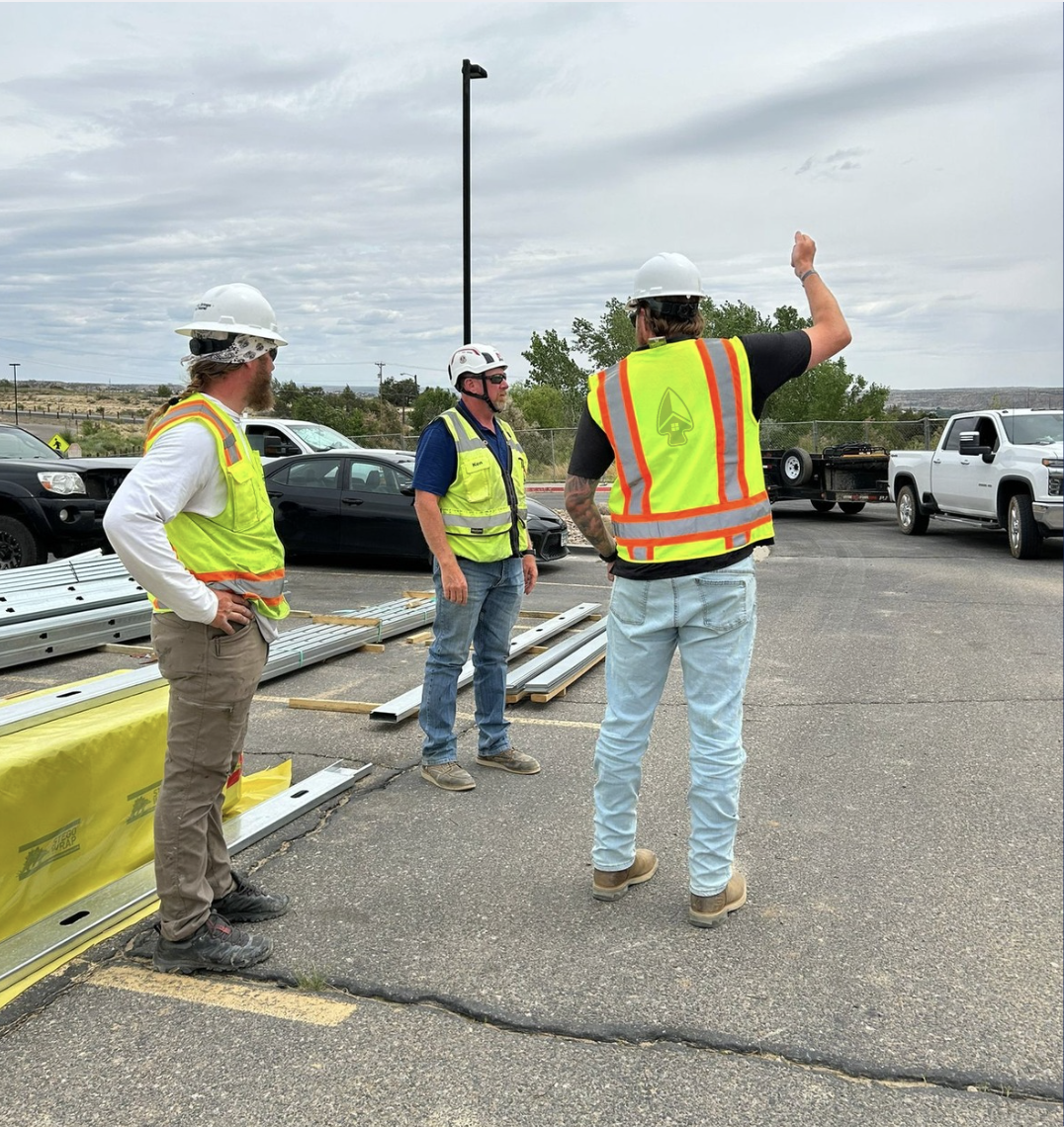 Licensed roofing contractor on a commercial roofing jobsite in Palm City wearing proper safety gear