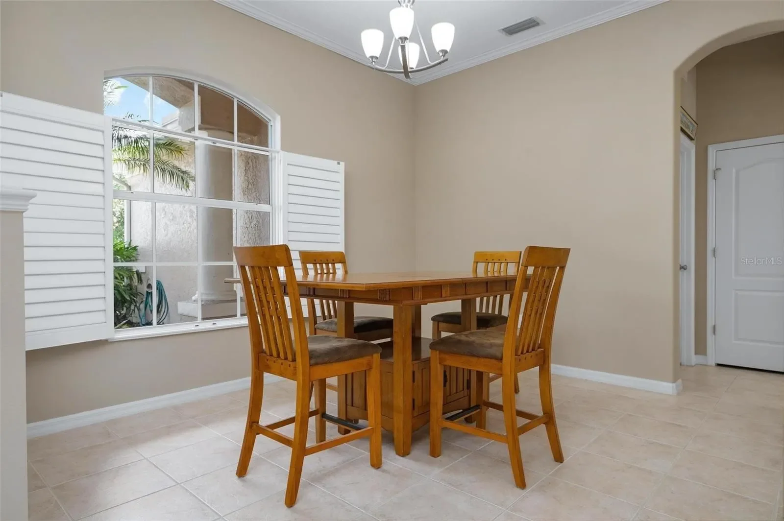 Before photo of dining room in Lakewood Ranch  Florida home prior to interior styling by  Kristen Jensen Kitt and Kaboodle