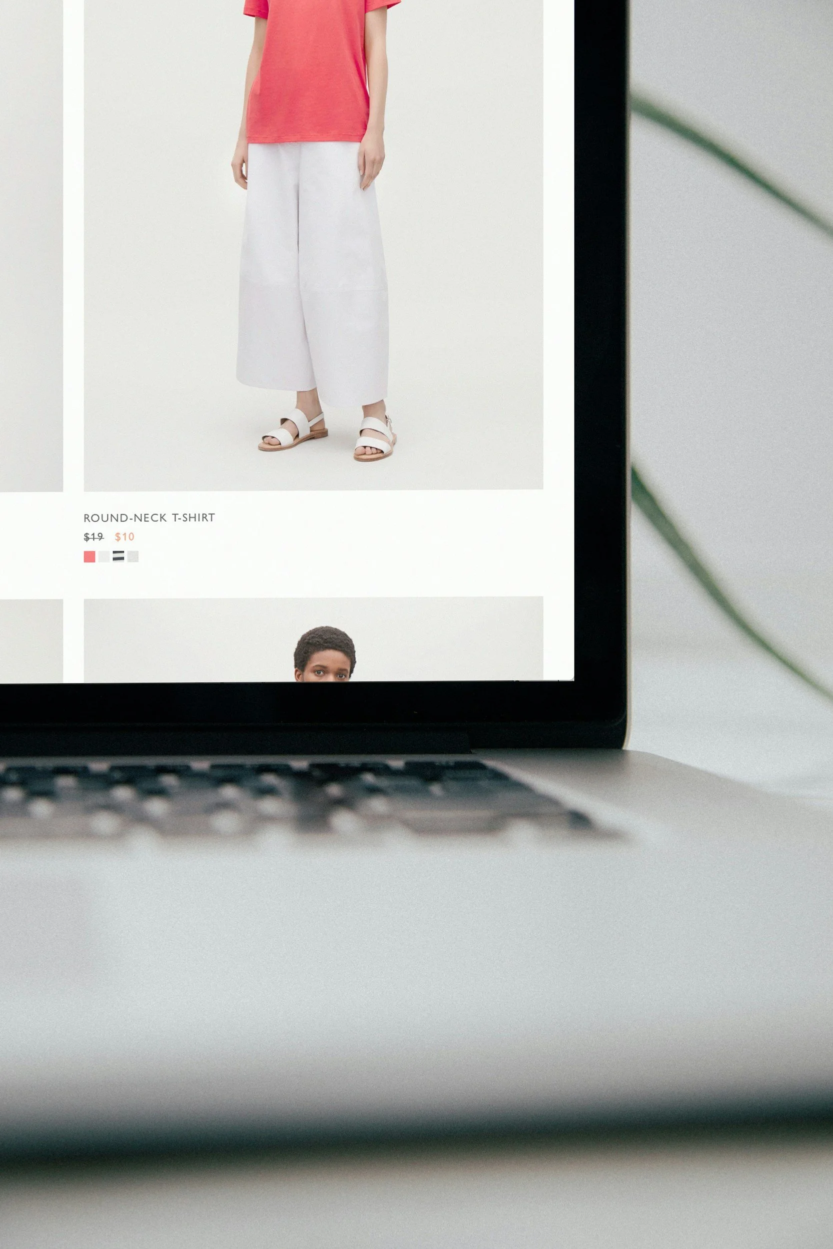 A laptop screen showing an online clothing store, representing ecommerce website design and digital marketing support for lifestyle businesses