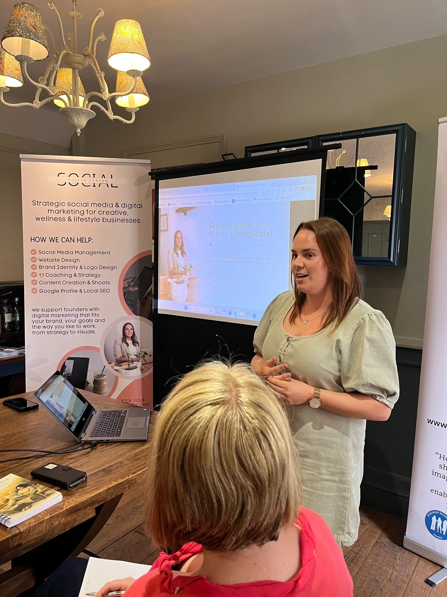 Grace from Silver Lining Social presenting a digital marketing talk to small business owners