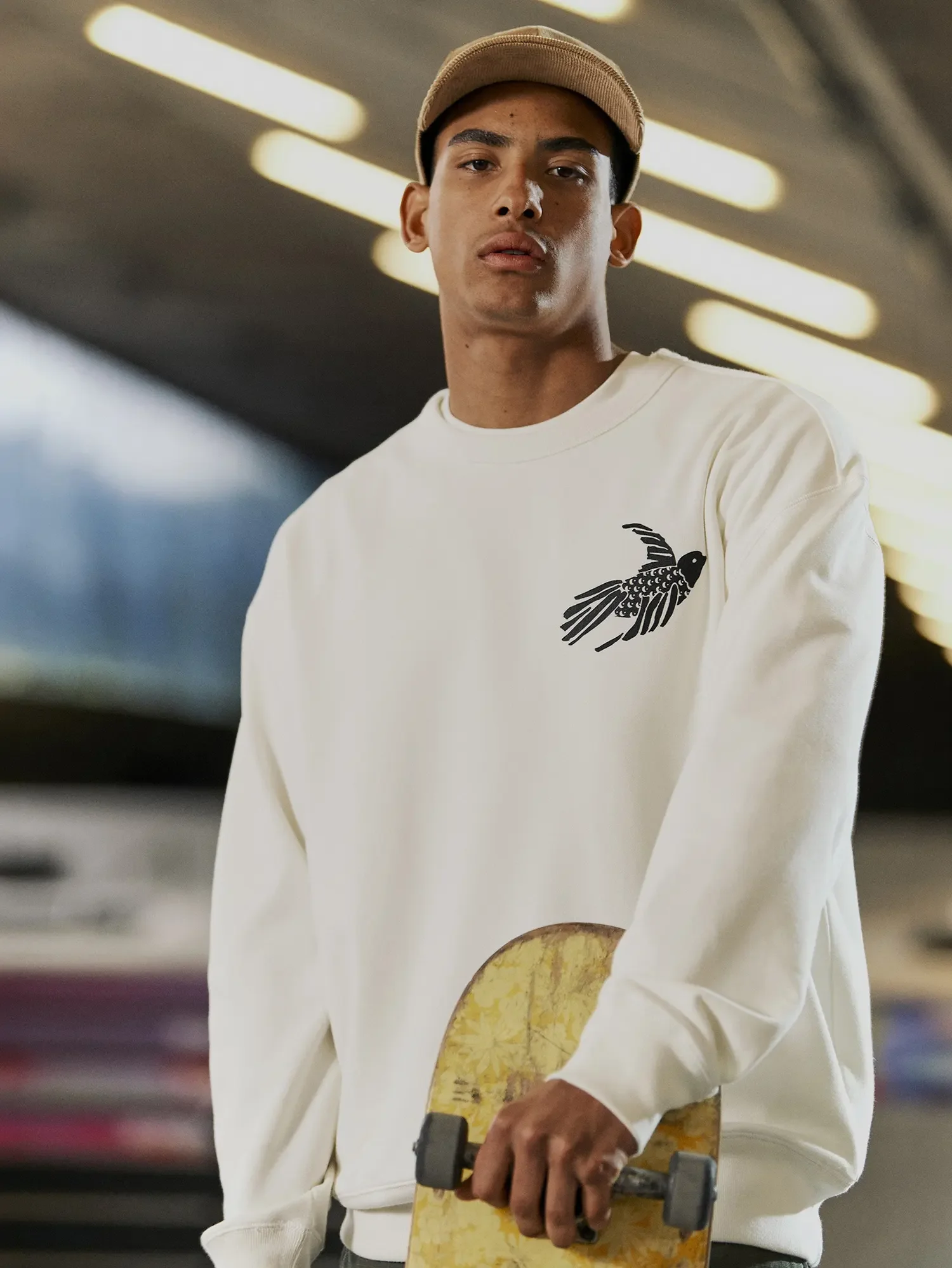 ecommerce-photography-mens-white-sweatshirt-on-model-lifestyle.webp