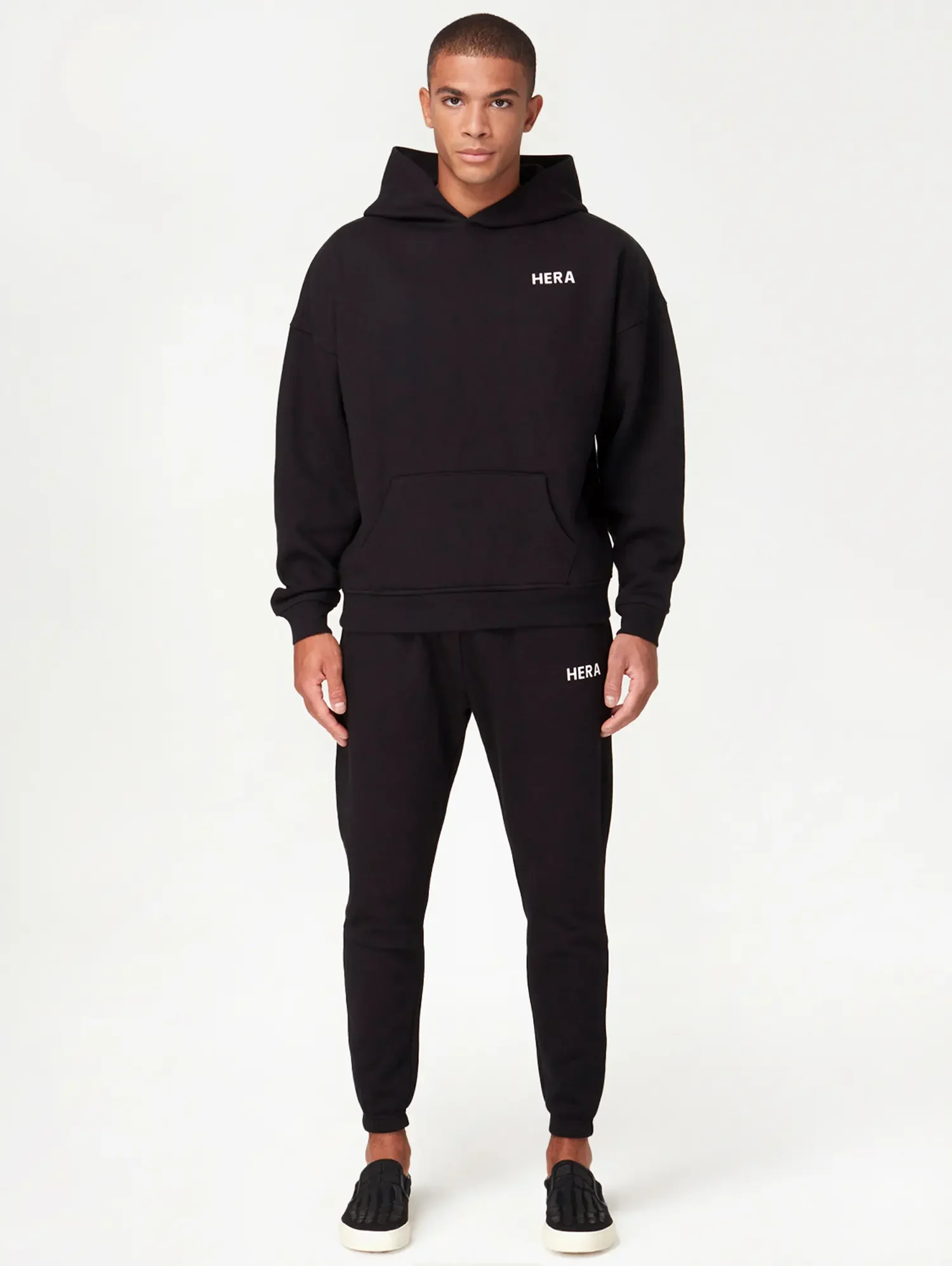 ecommerce-photography-mens-black-hoodie-joggers-on-model.webp