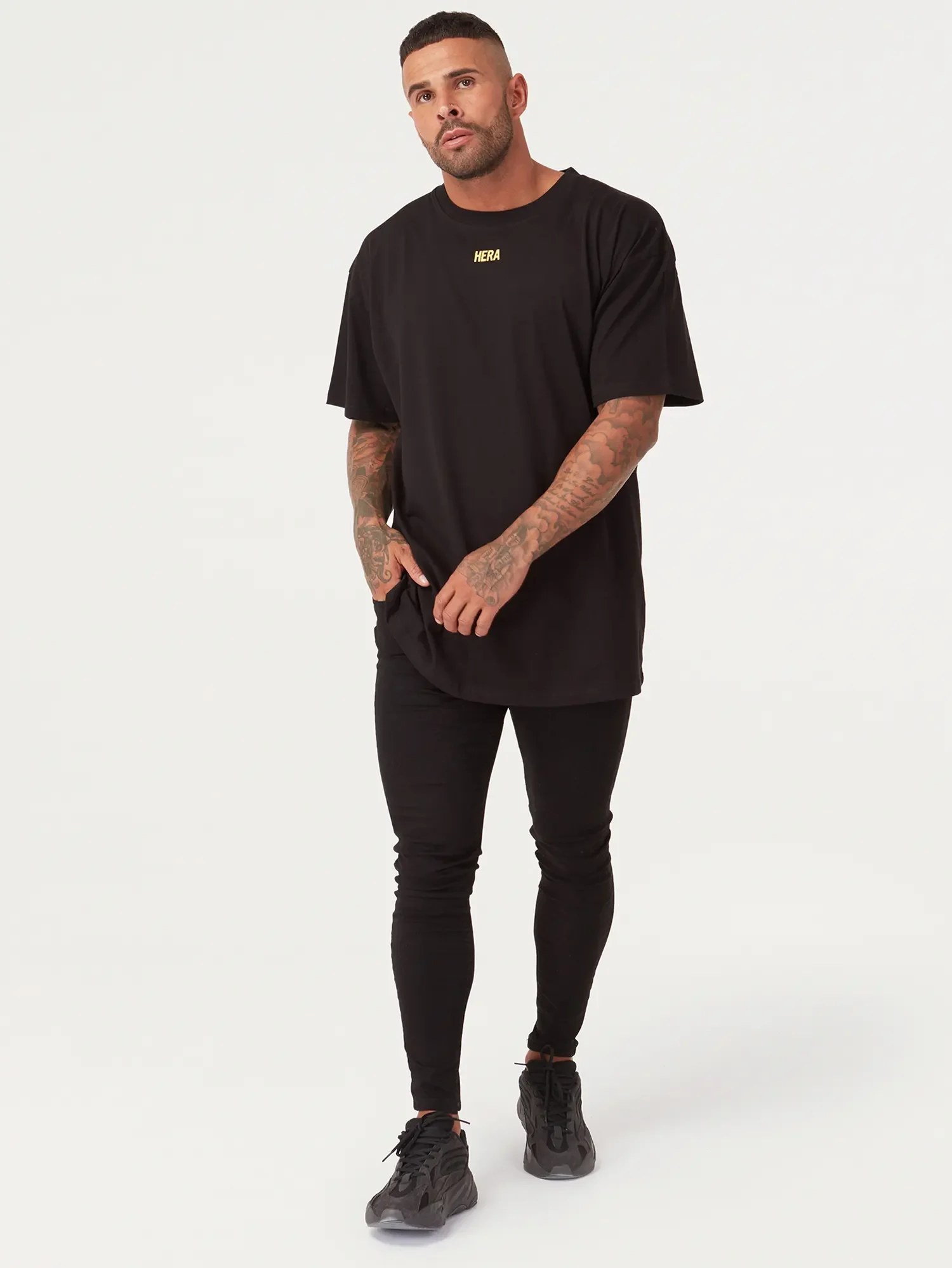 ecommerce-photography-mens-black-tshirt-black-jeans-on-model.webp