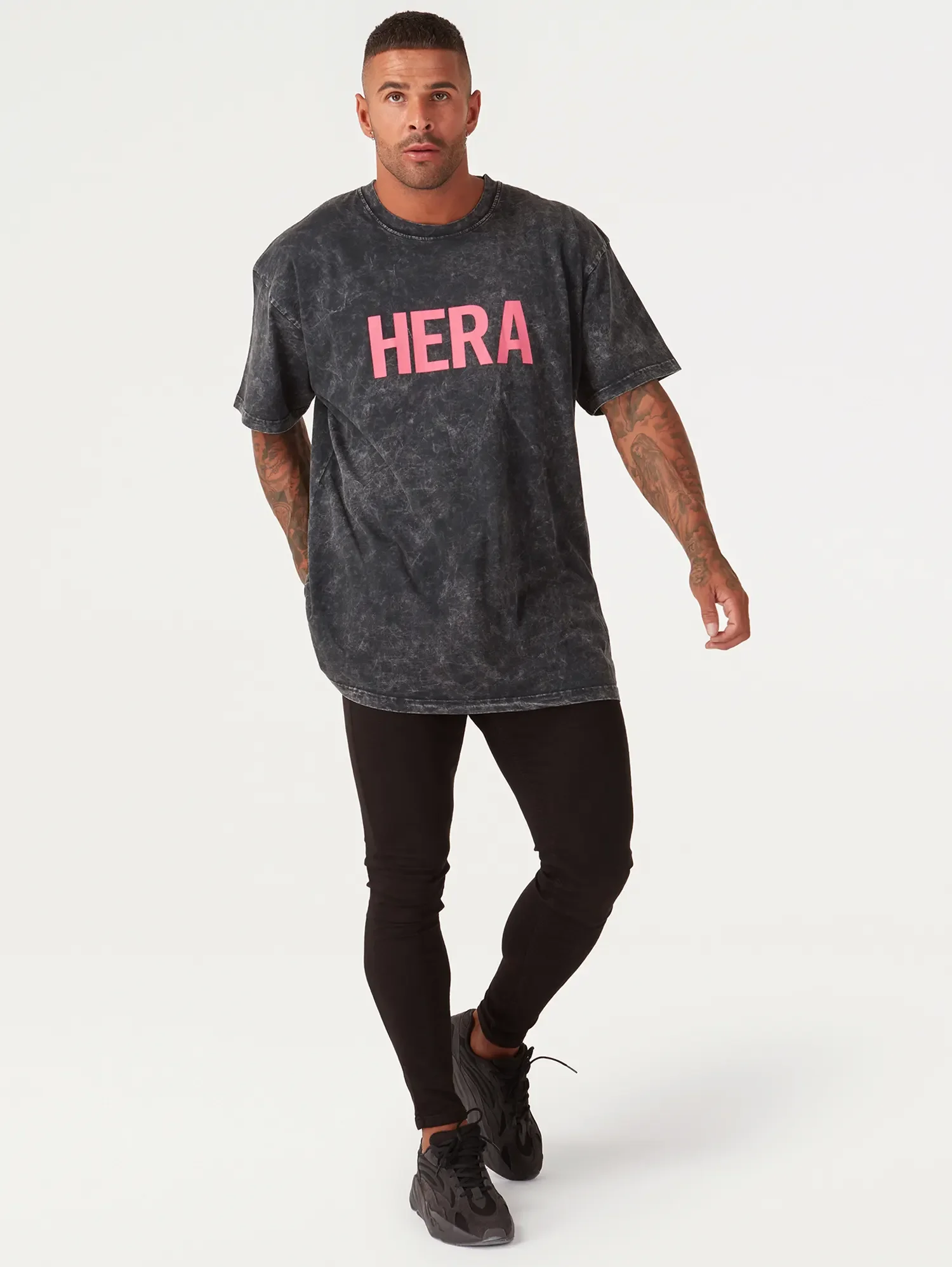 ecommerce-photography-mens-charcoal-logo-tshirt-black-jeans-on-model.webp
