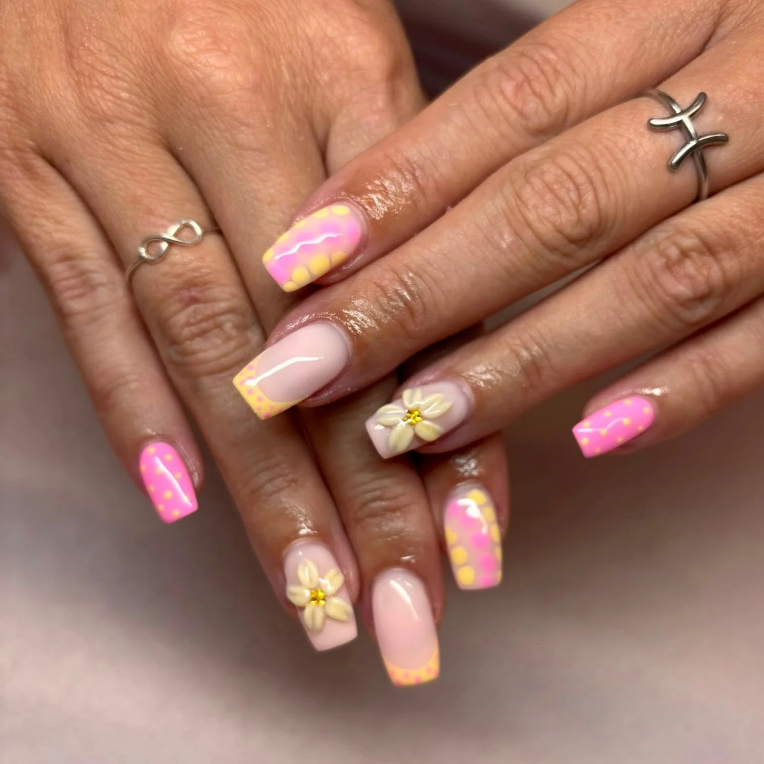 polka &amp; petal perfection 🩷🌸💛

summer has officially arrived with this set! pushing @nailsbyloisjade.x to do new custom sets&hellip; we love it! 

clients bring in such gorgeous inspo and Lois make it a reality!! 

just look at this set 🤩🤩🤩
