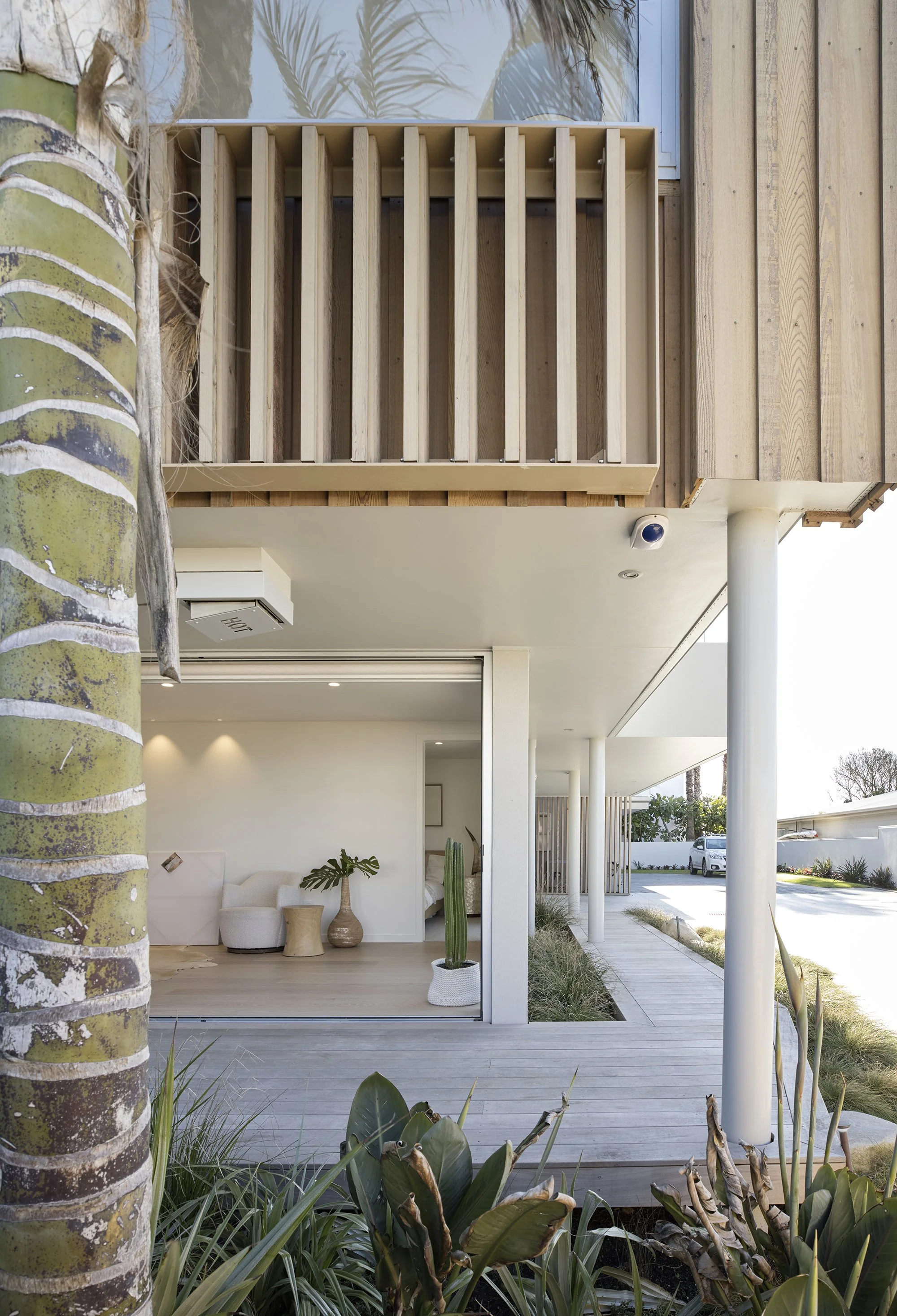 Exterior of Surf’s Edge Tauranga home featuring contemporary coastal design