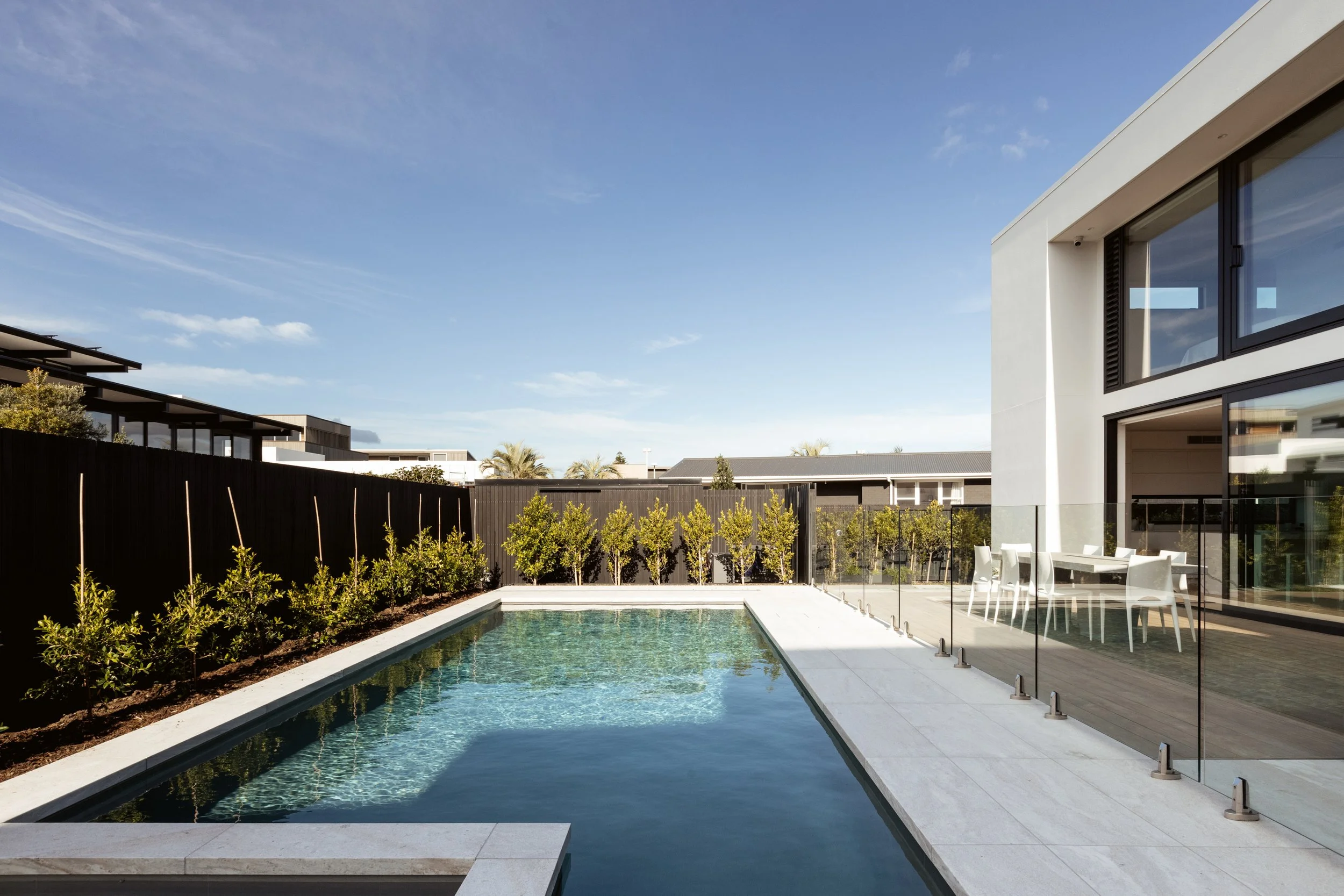 Front view of Beachside Minimalism Tauranga home showcasing minimalist coastal design and pool
