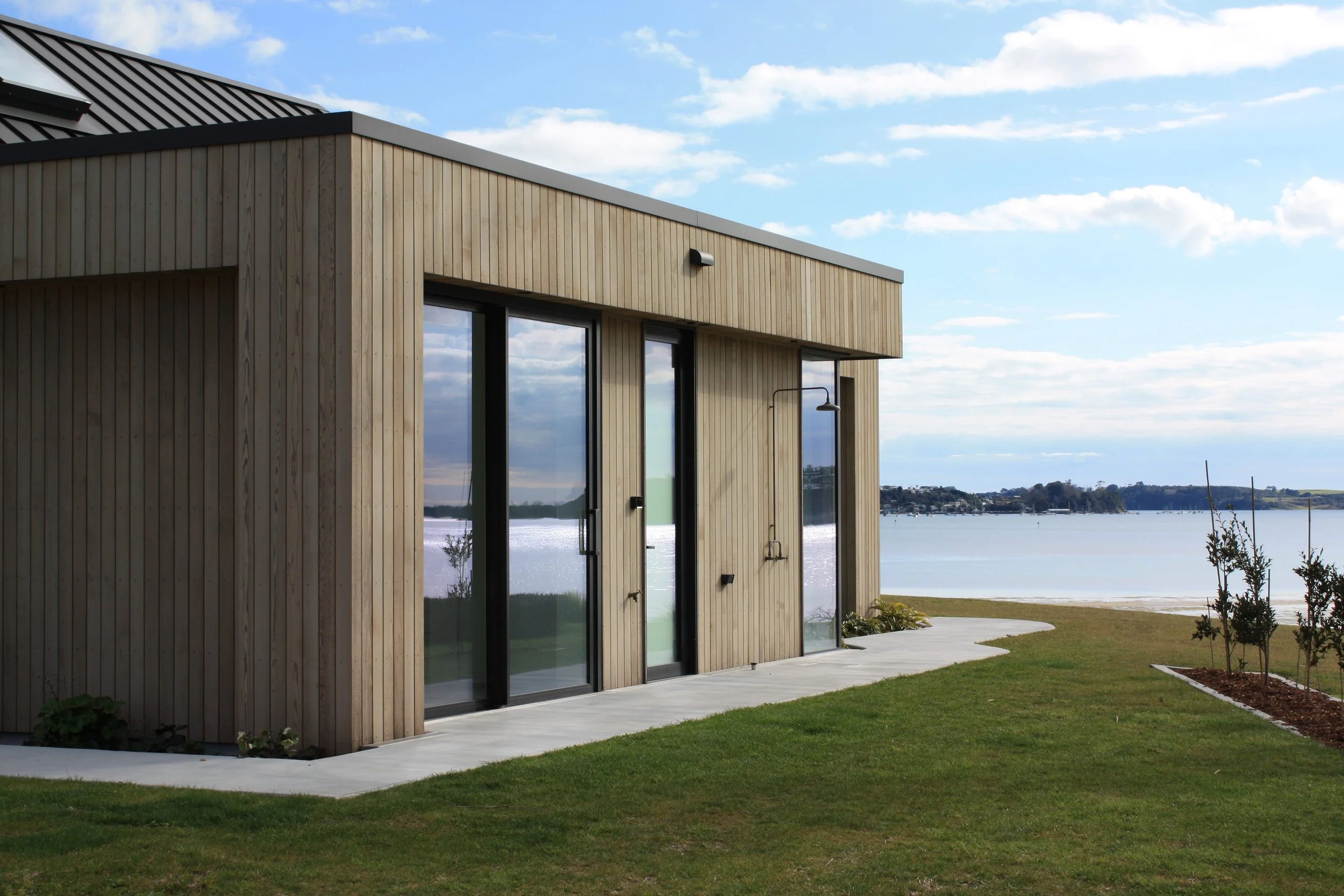 Exterior of Harbour View home in Tauranga with timber cladding