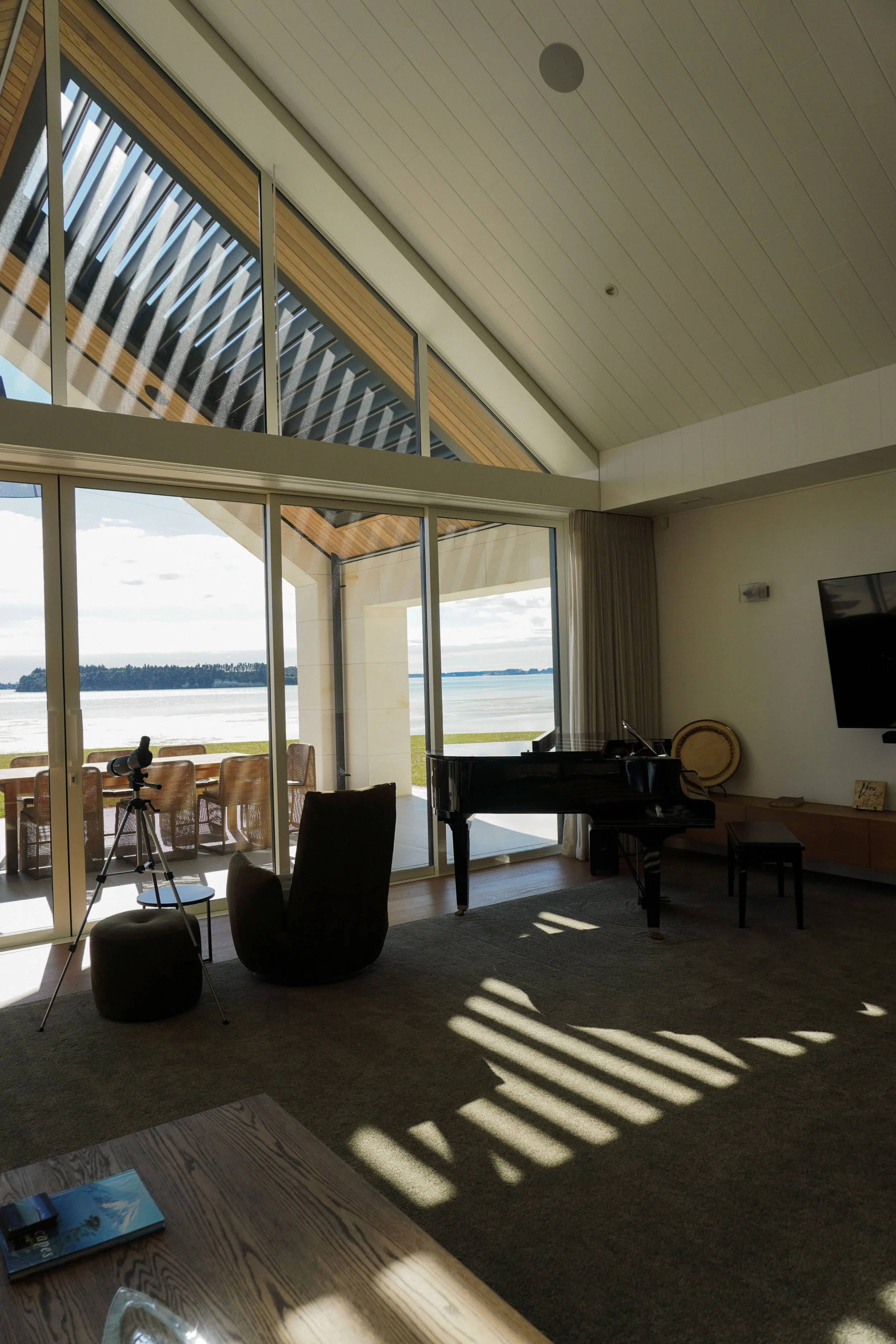 Open-plan living and dining areas in Harbour View Tauranga home for family gatherings