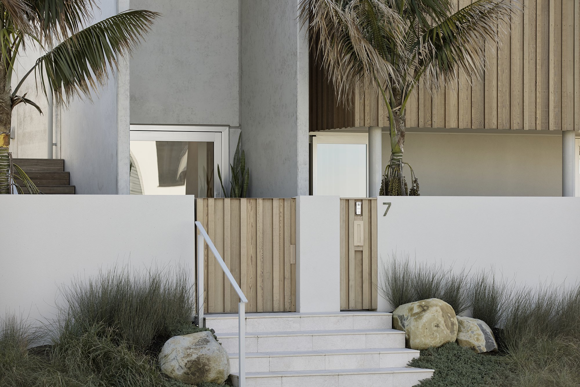 Entryway of Surf’s Edge Tauranga home with contemporary coastal design