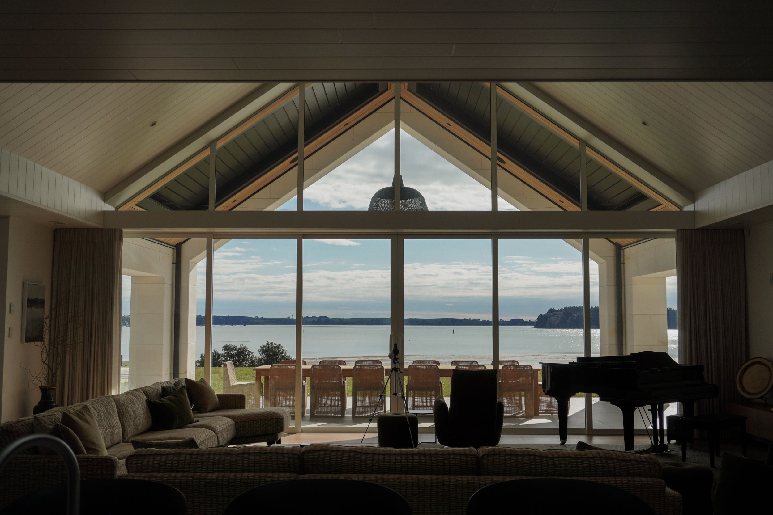 Open-plan living and dining areas in Harbour View Tauranga home for family gatherings