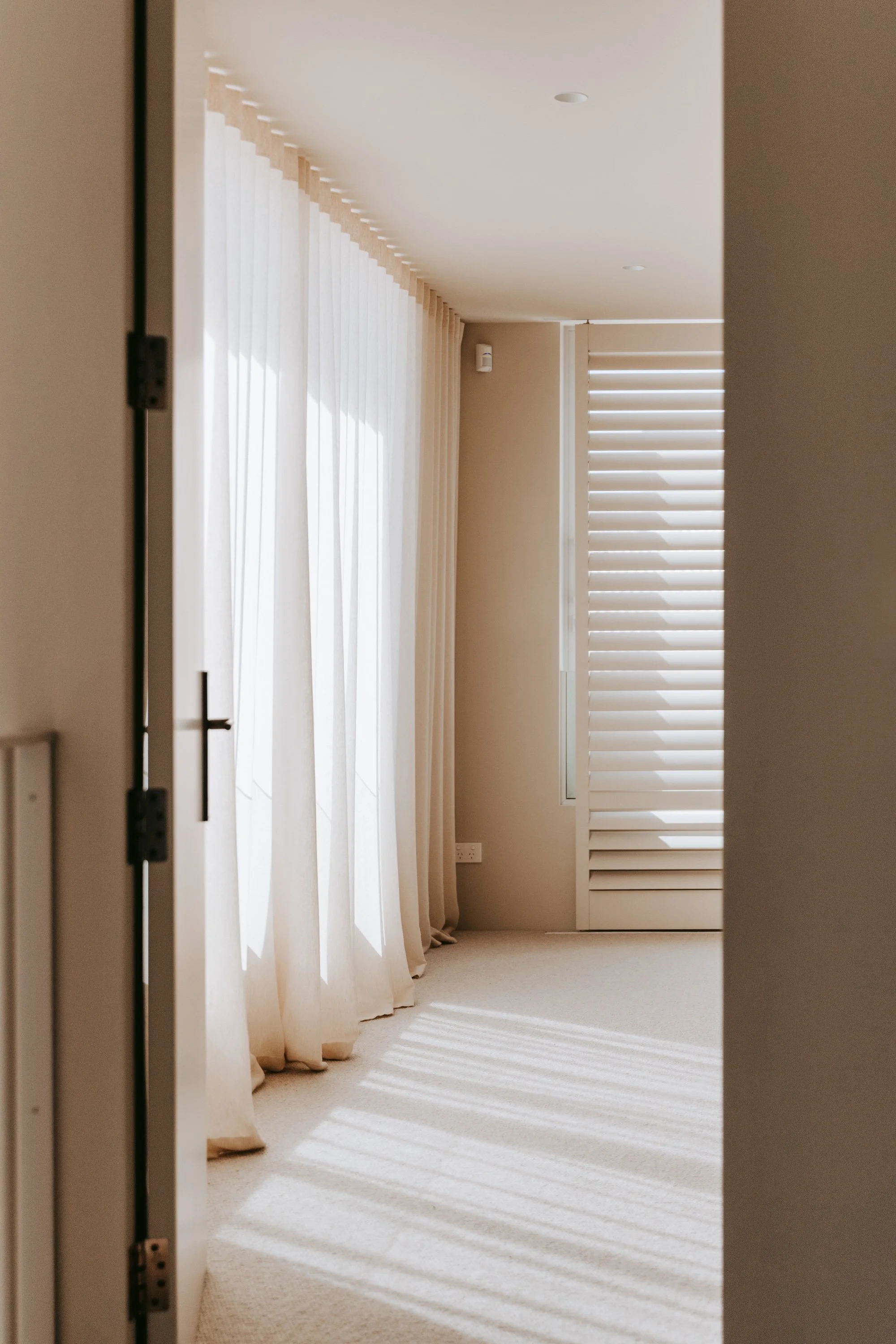 Bedroom in Palm Springs Mount Maunganui home renovation with natural lighting