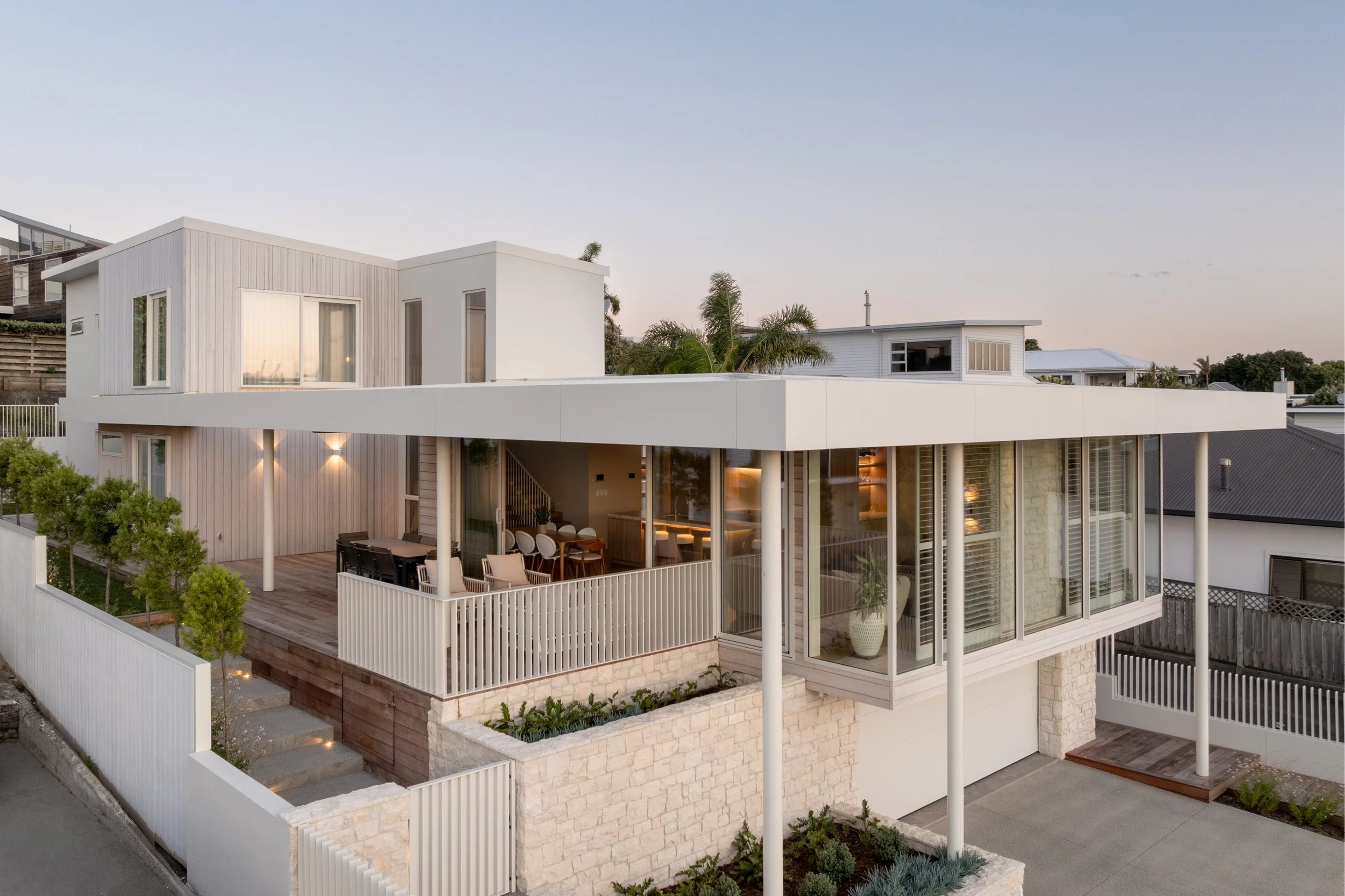 Side view of Palm Springs Mount Maunganui renovation showing flat roof and generous eaves
