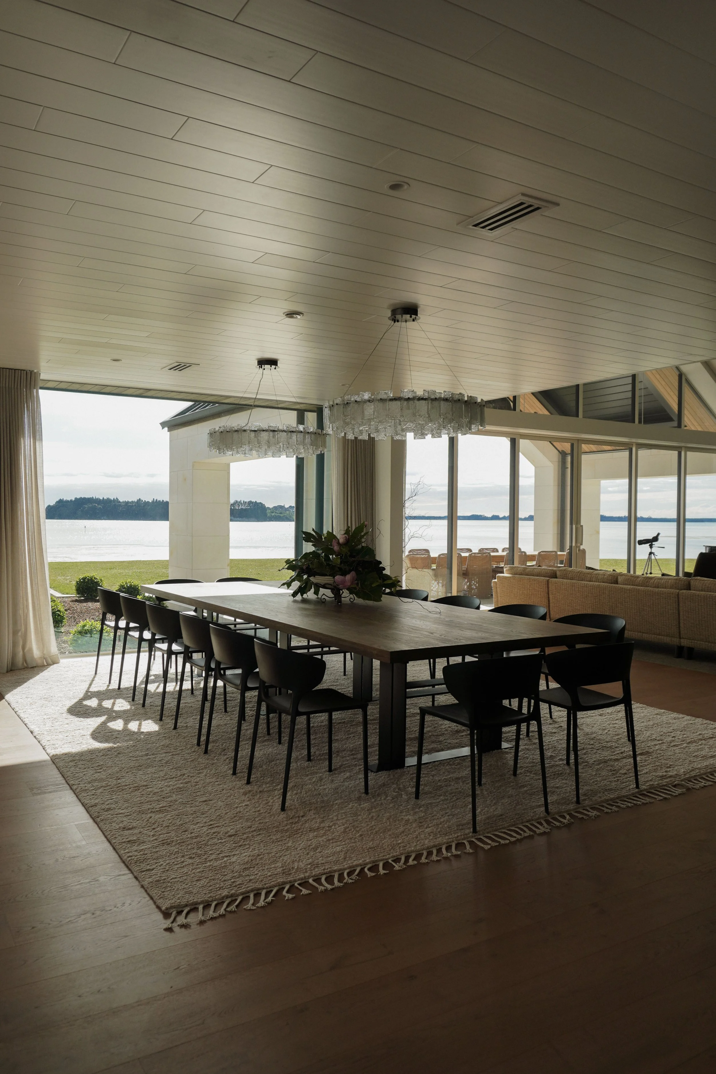 Open-plan living and dining areas in Harbour View Tauranga home for family gatherings