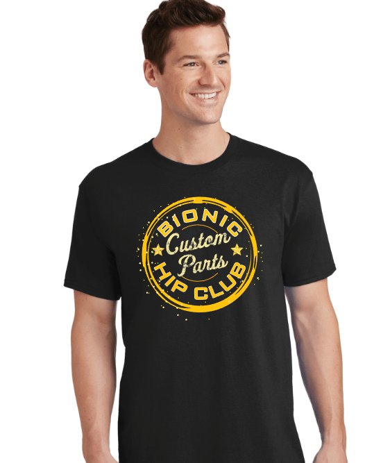 A young man with brown hair is wearing a black T-shirt with yellow and white text that reads 'BIONIC Custom Party HIP CLIB,' with stars and circular design elements.