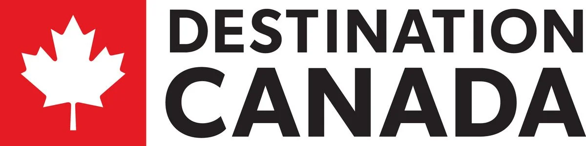 A logo with a red vertical strip featuring a white maple leaf, and the words 'Destination Canada' in black and gray text to the right.