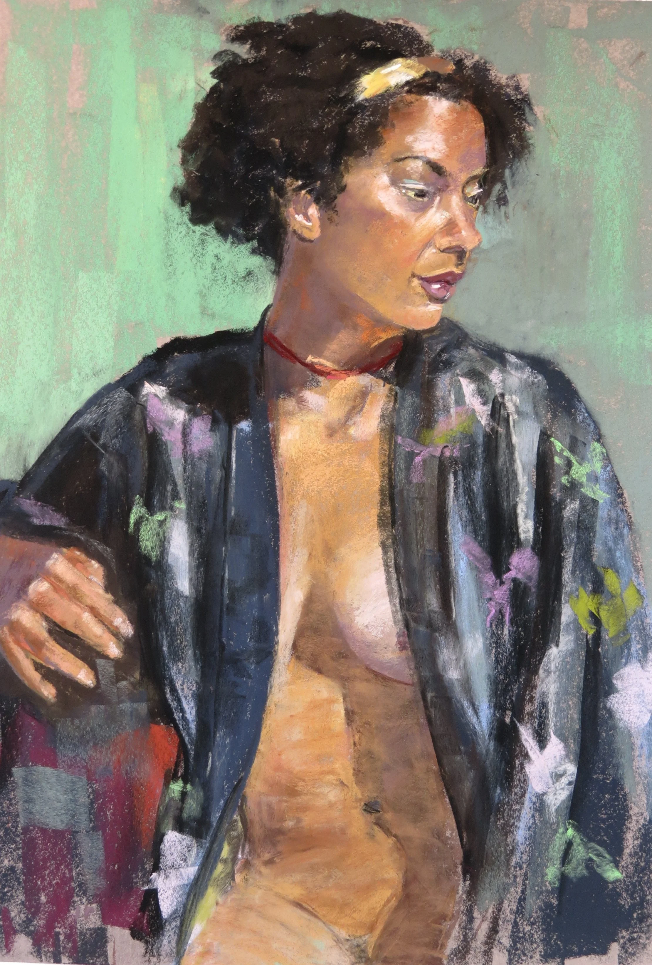 A portrait of a woman with dark curly hair wearing a black jacket with floral patterns, a red choker, and showing her partially nude upper chest and shoulder.