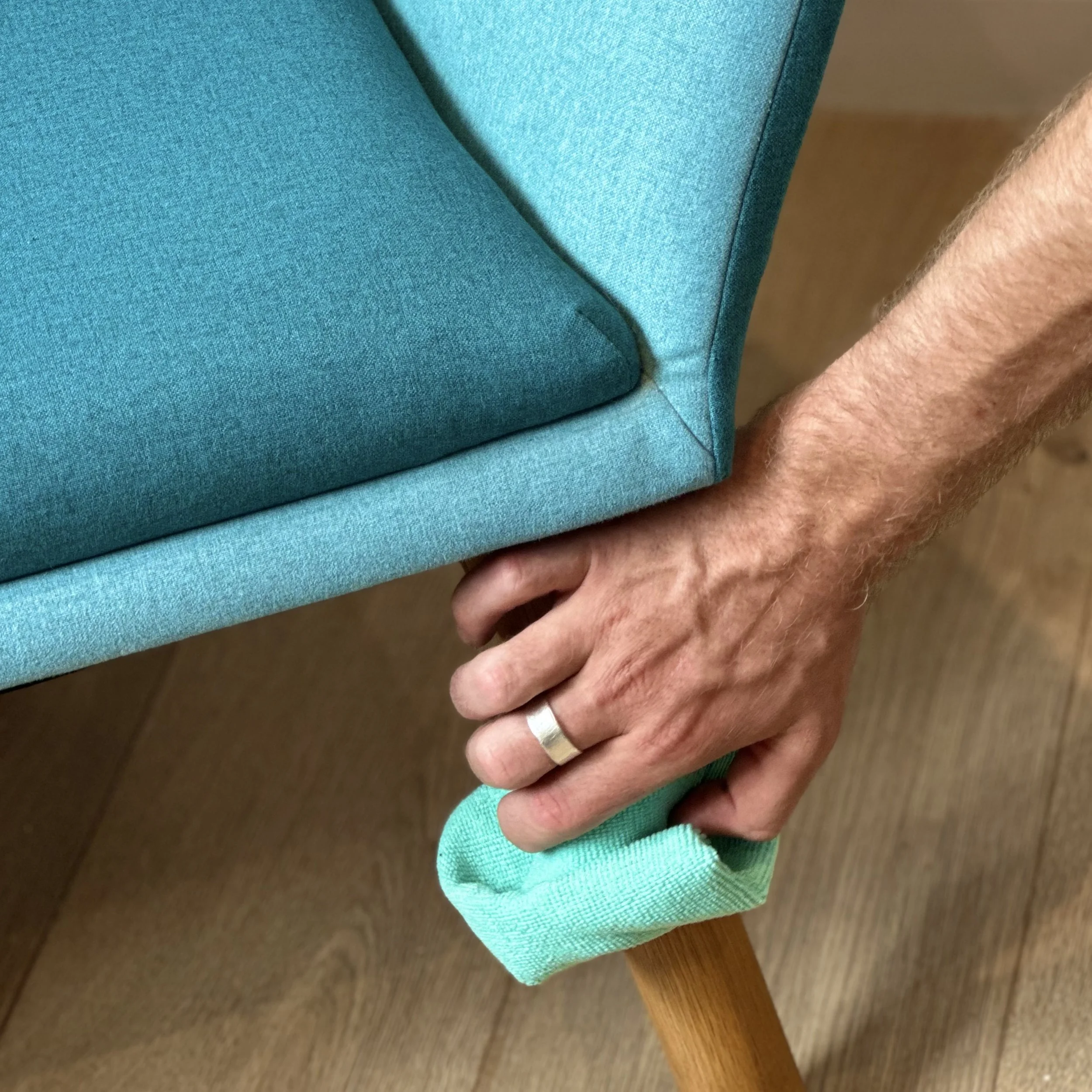 Image of a chair being cleaned as a house is being prepared for sale