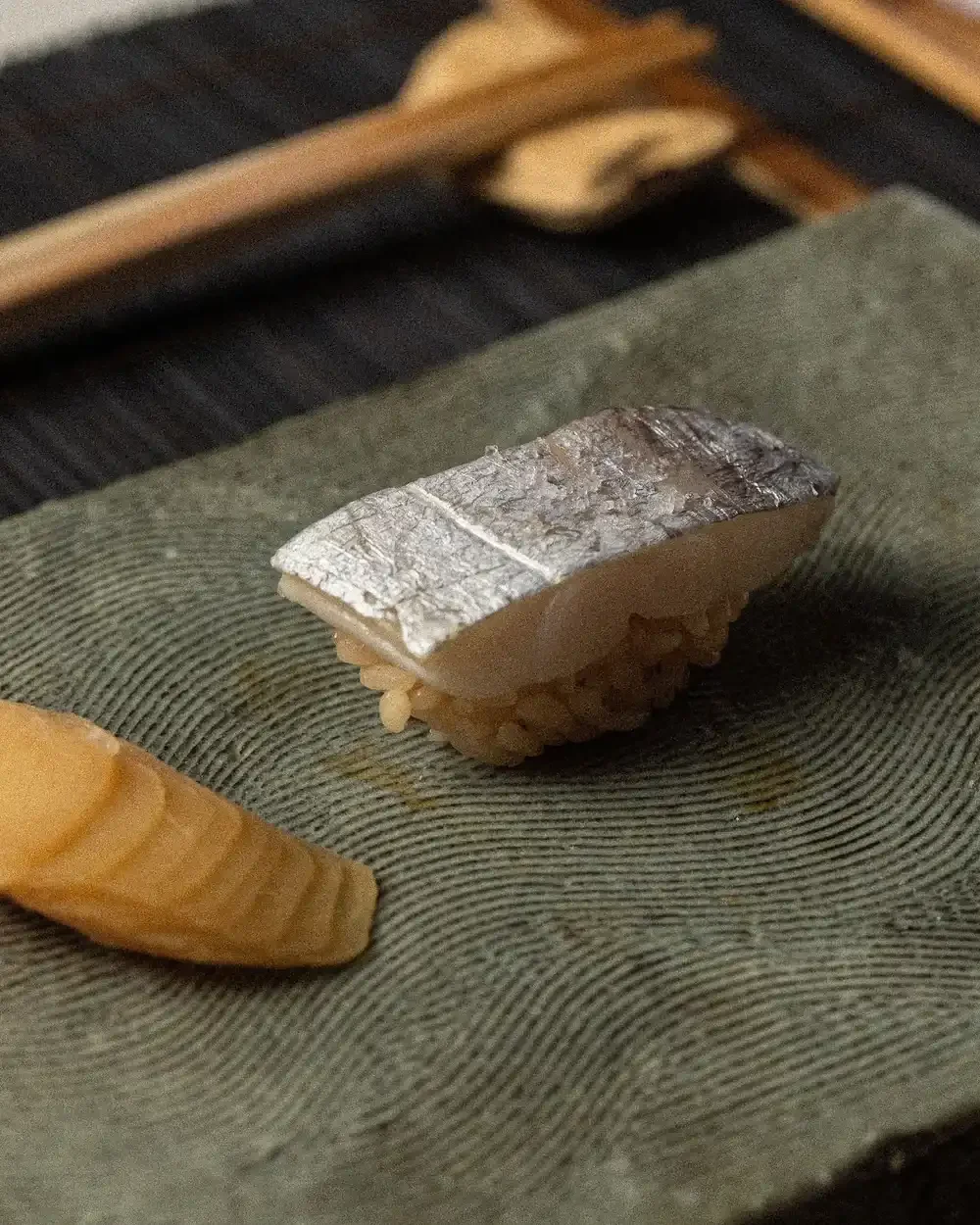 Edomae nigiri featuring silver-skinned fish.