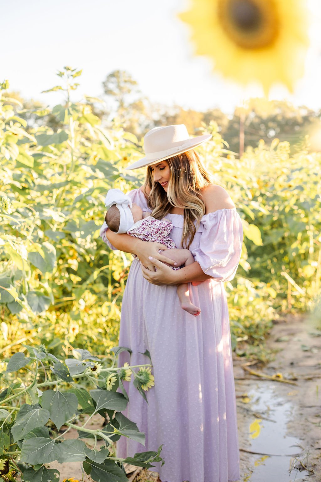 Expecting mother during a maternity photography session in Houston by Rose Tello