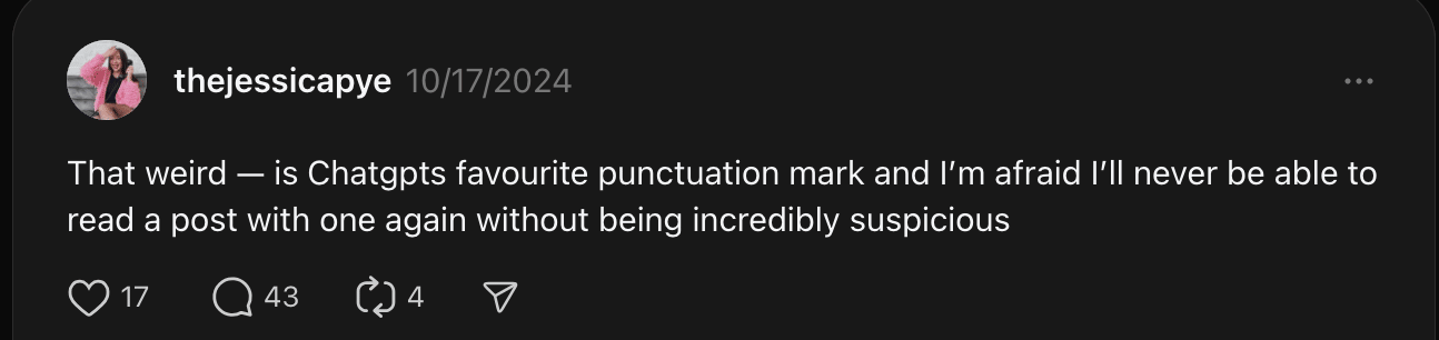 A screenshot of a Threads comment that reads "That weird — is Chatgpts favourite punctuation mark and I'm afraid I'll never be able to read a post with one again without being incredibly suspicious"
