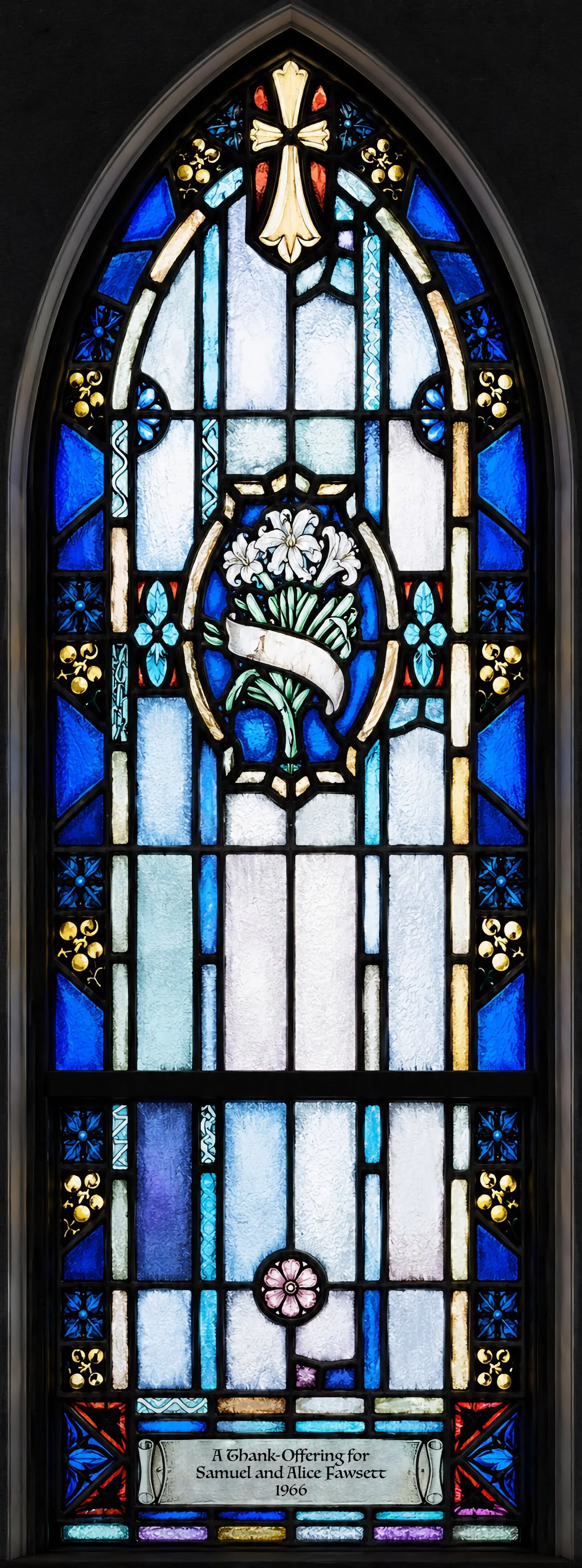 Resurrection (Gospel side, nearest the altar). Easter lilies. Given as "A Thank-offering for Samuel and Alice Fawsett, 1966."