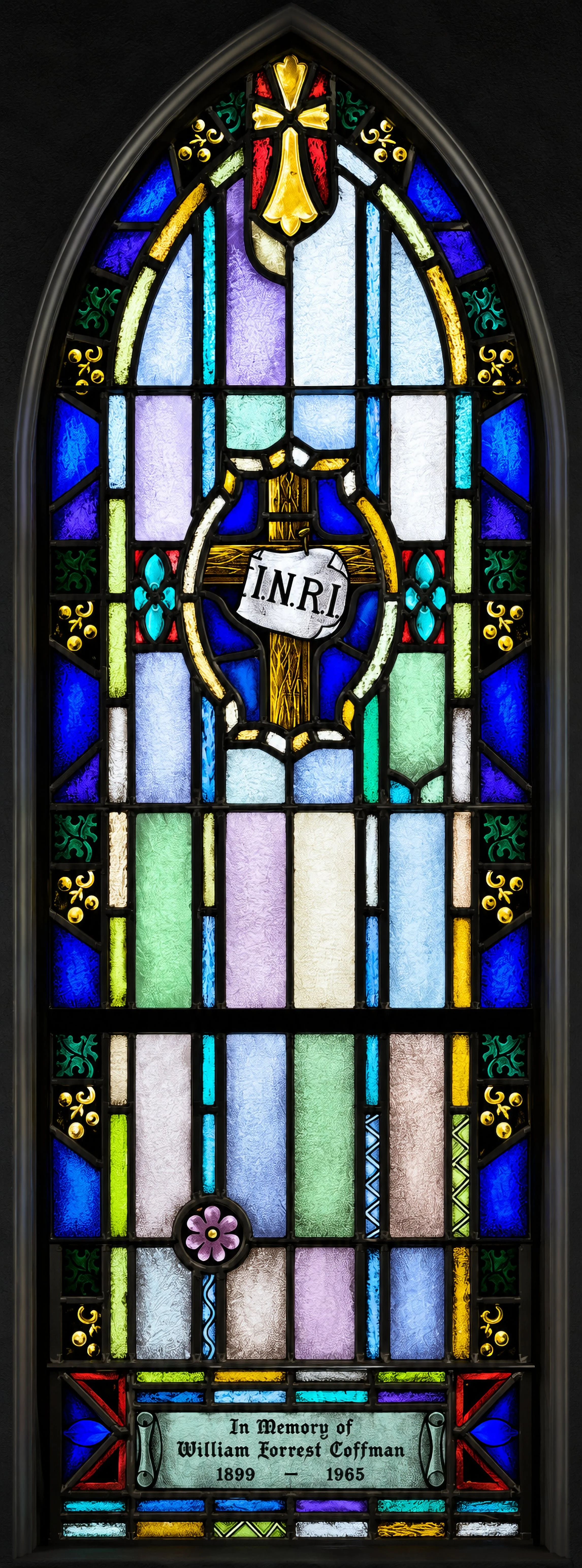 Crucifixion. The cross bears the initials I.N.R.I. — Iesus Nazarenus Rex Iudaeorum, "Jesus of Nazareth, King of the Jews" — the title affixed by order of Pontius Pilate (John 19:19–20).