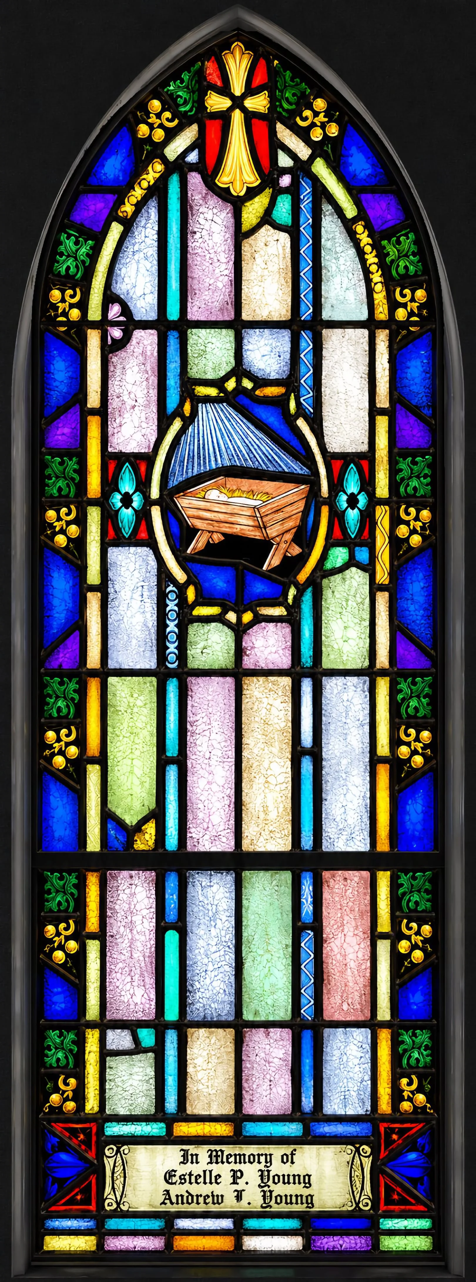 Nativity. The manger of Bethlehem, with a star above (Luke 2:4–7).