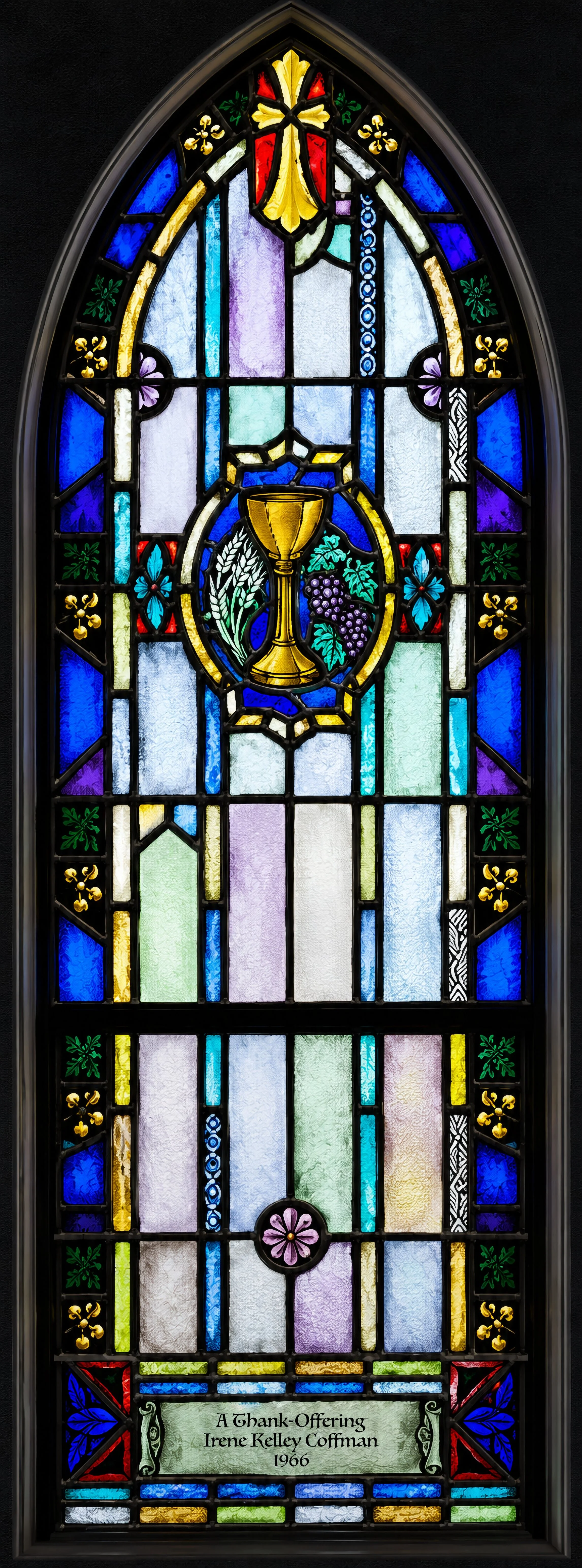 The Last Supper. A chalice with wheat and grapes recalls the institution of the Holy Eucharist (Matthew 26:26–28; Mark 14:22–24).