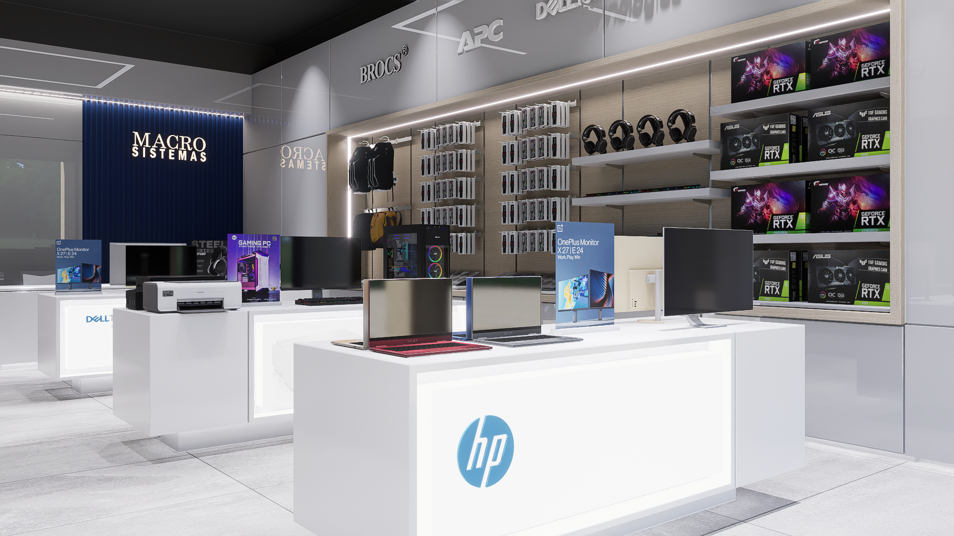 Interior de una tienda de tecnología con mostradores, monitores y laptops de distintas marcas, además de accesorios como audífonos y componentes de computadoras, con estantes que exhiben tarjetas gráficas y mochilas para computadoras.
