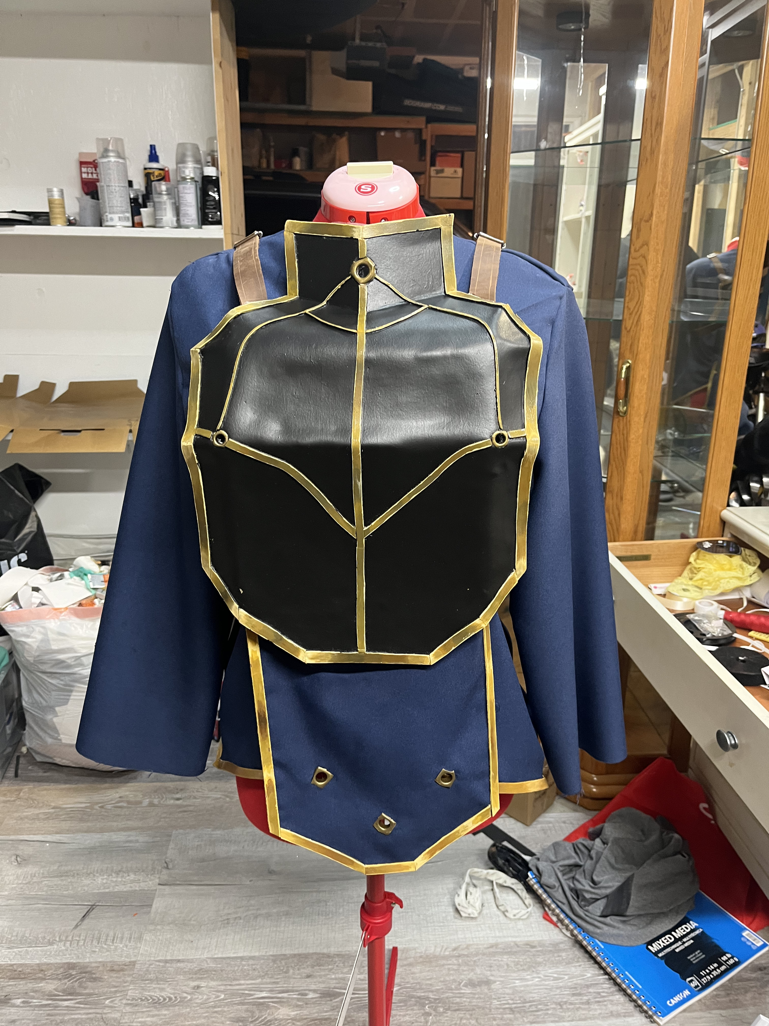 Here is the finished chest armor. Painted using acrylic paint and sealed with flexible sealant. The uniform has also had accents added to it using the same method.