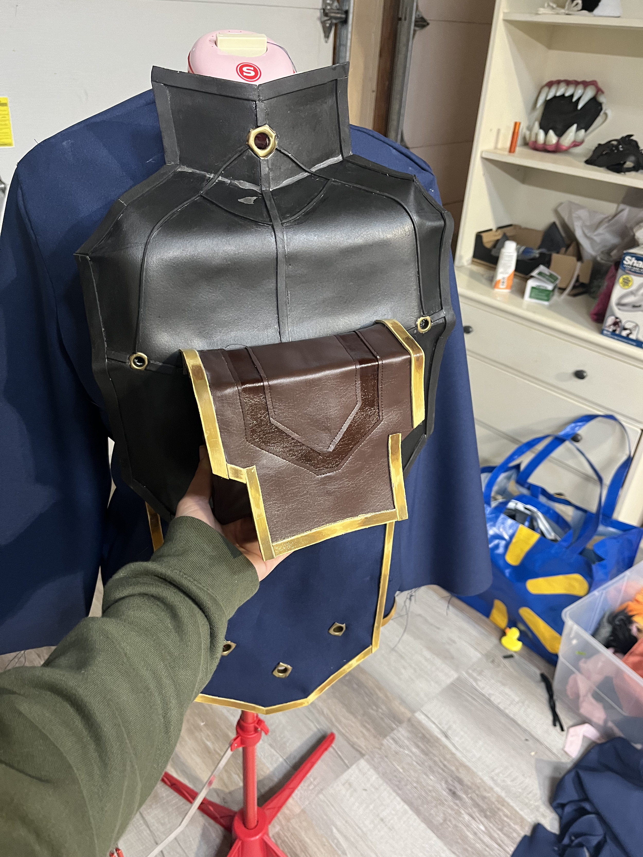 After creating a pattern for the bags, I sewed the bags using faux leather, and foam for the details
