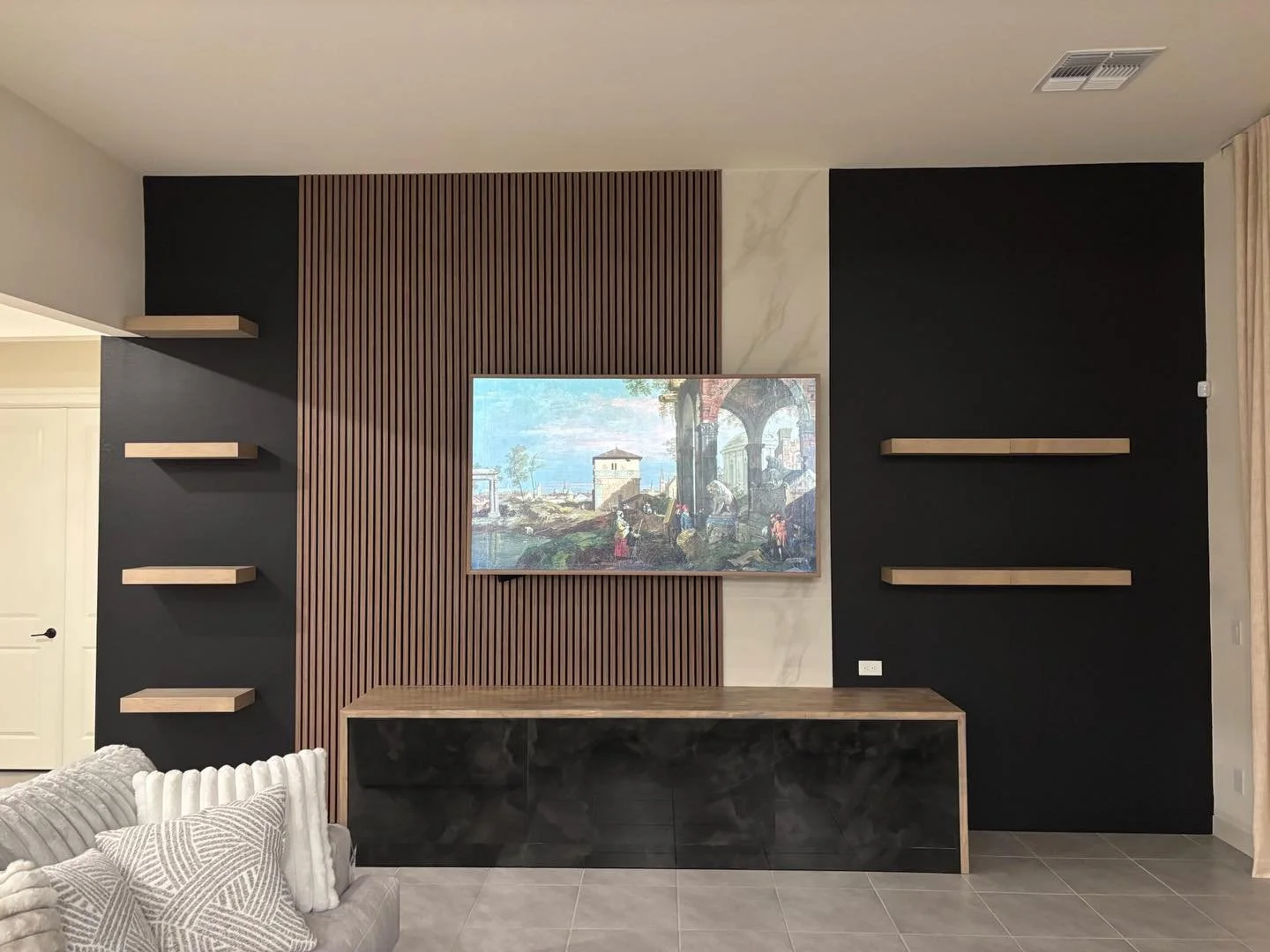 Natural textures done right by @savage_installations 
Warm wood slats, stone detail, and clean lines come together to create a true statement media wall.

Built to stand out &mdash; designed to elevate the entire space.

📍East Valley pickup &amp; de