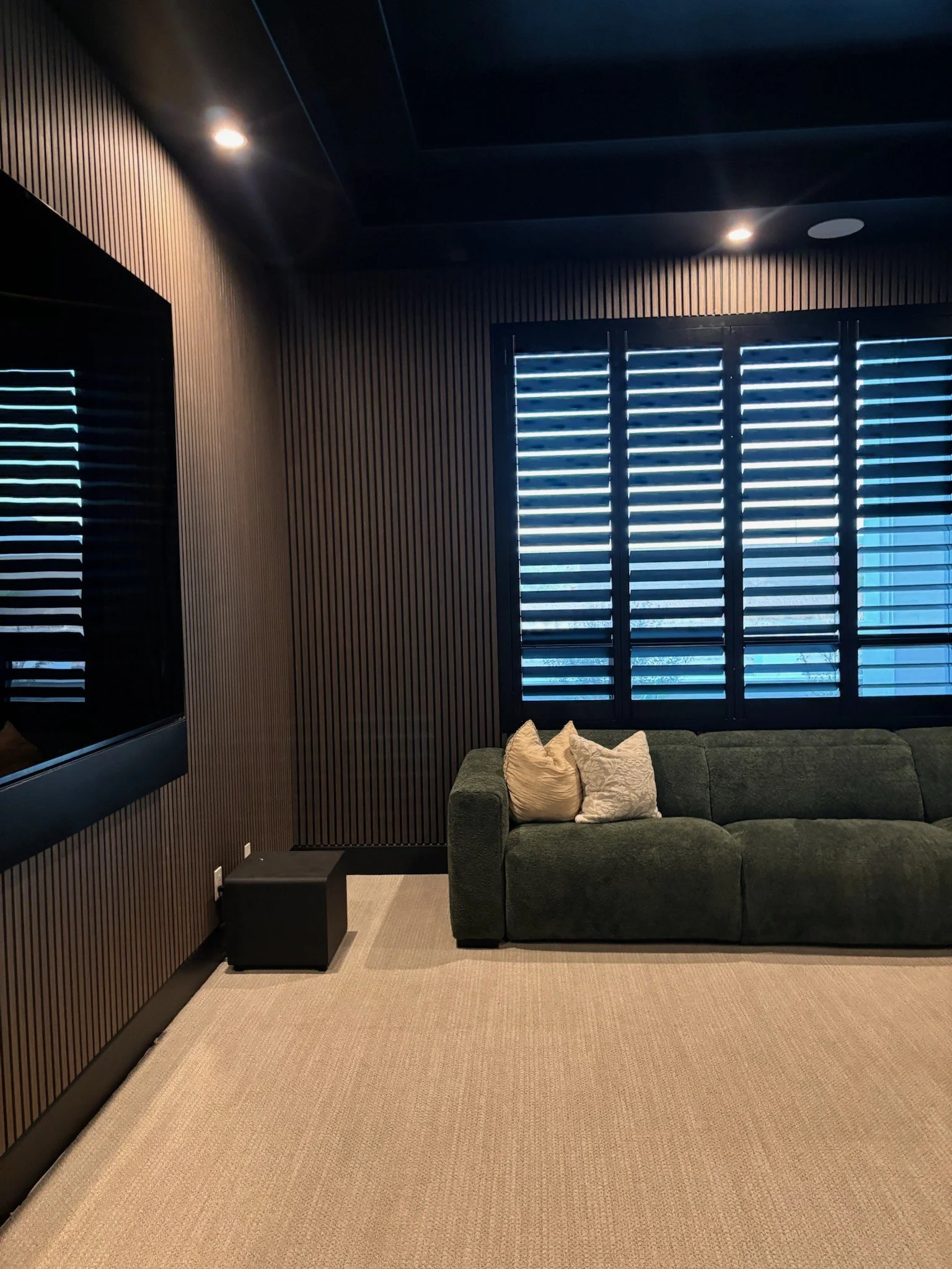 09-walnut-dark-oak-theatre-room.jpg