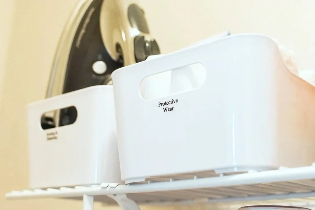 Labeled bins in an organized laundry system