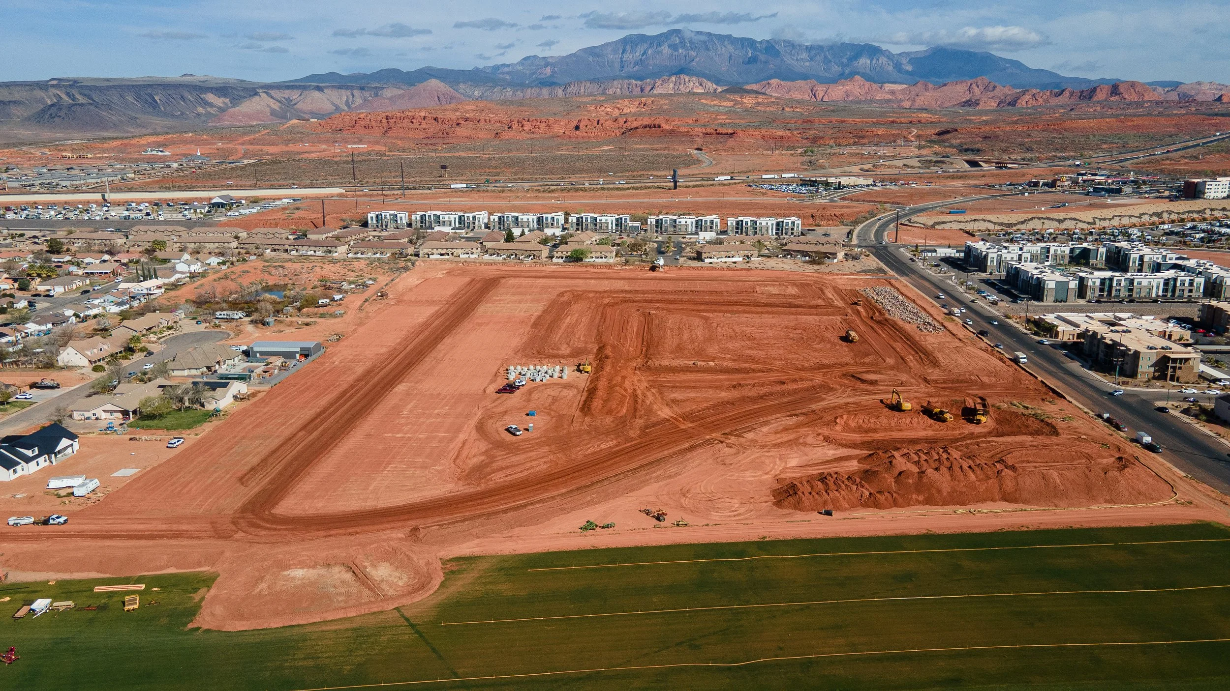 Aerial view of land development site in a high-growth Mountain West corridor