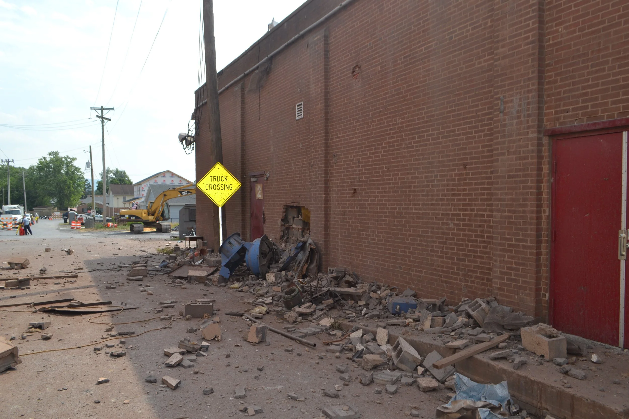 Image of debris strewn down the street.