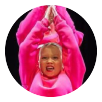 Girl wearing bright pink sweatshirt extending her arms above her head with palms together