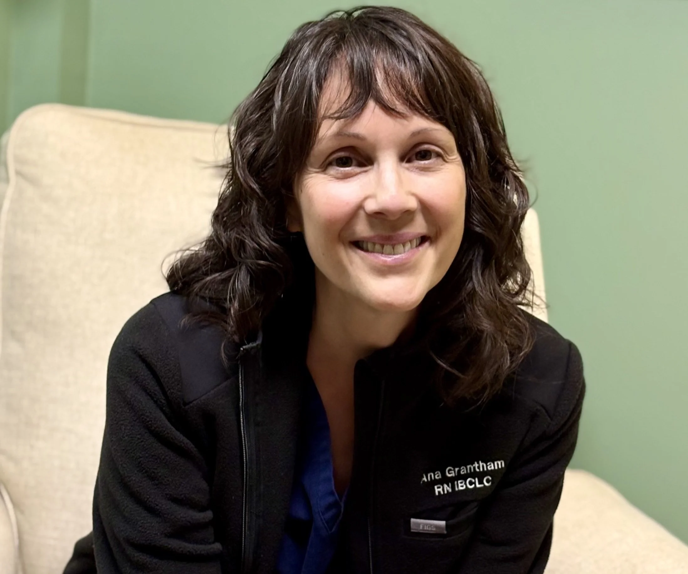 Ana Grantham RN IBCLC lactation consultant in her Lafayette Colorado office supporting Boulder County families