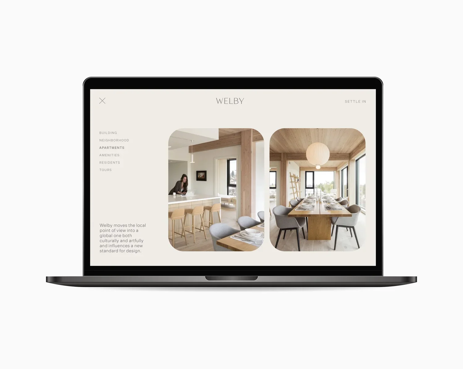 Laptop displaying a website for Welby showcasing images of modern, minimalist dining and kitchen areas with light wood finishes and large windows.