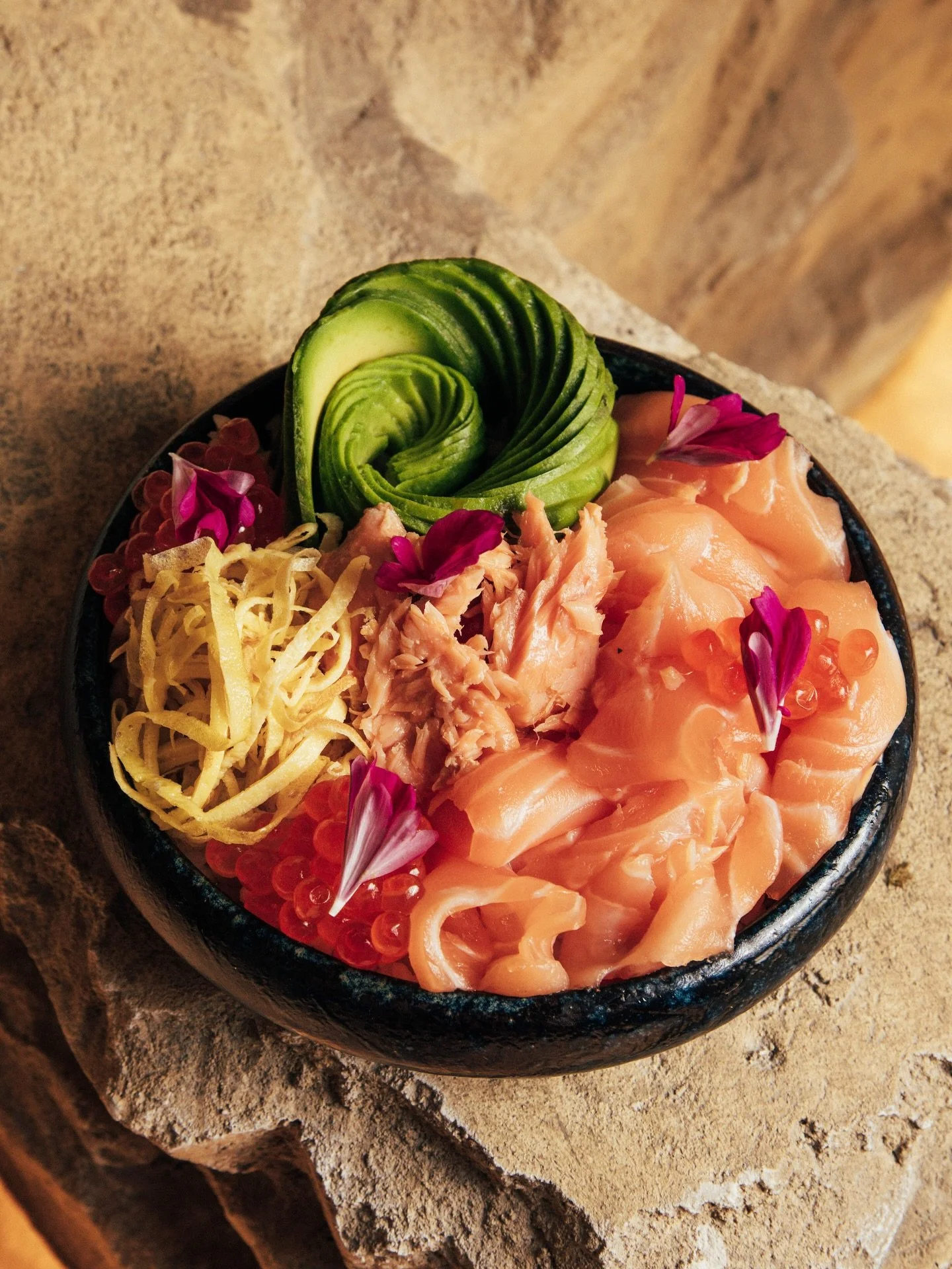 Our Chirashi Bowl Salmon! 🇯🇵🌸 Layers of pure flavor. 🥢
Fresh salmon, truit roe egg, shredded salmon, caviar lime, avocado, cucumber, fennel flower, green onion, nikiri sauce, and eggs &mdash; all coming together in one vibrant bowl.

Light, refin
