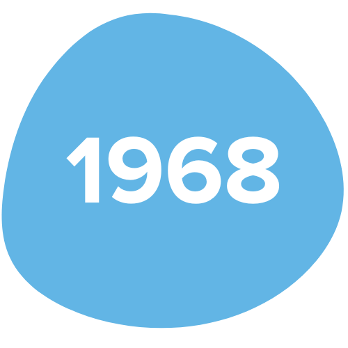 Blue irregular circle with white text reading '1968' in the center.