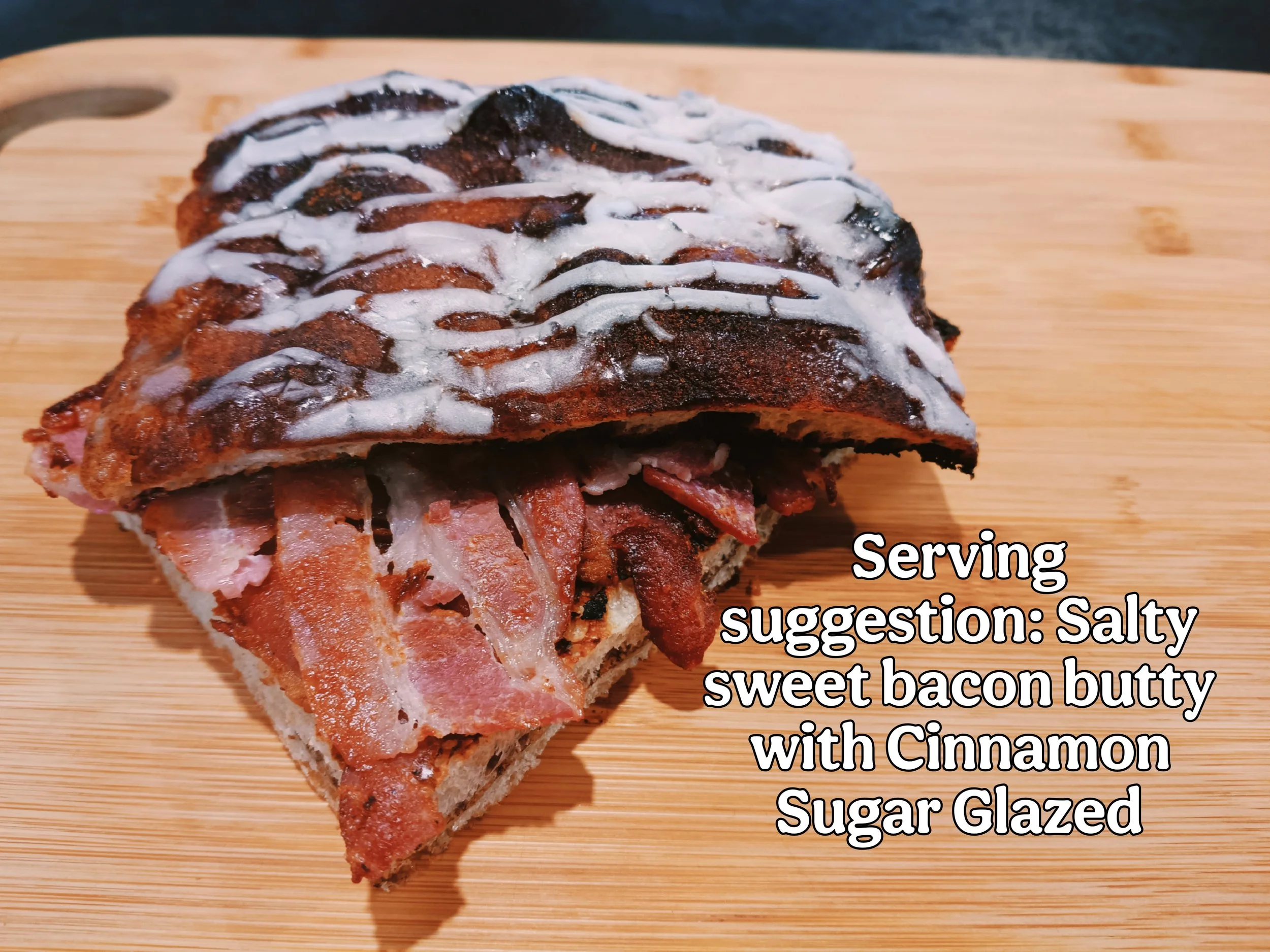 Salty sweet bacon butty on cinnamon sugar glazed sourdough focaccia bread by Kapiti Delicious Doughs.