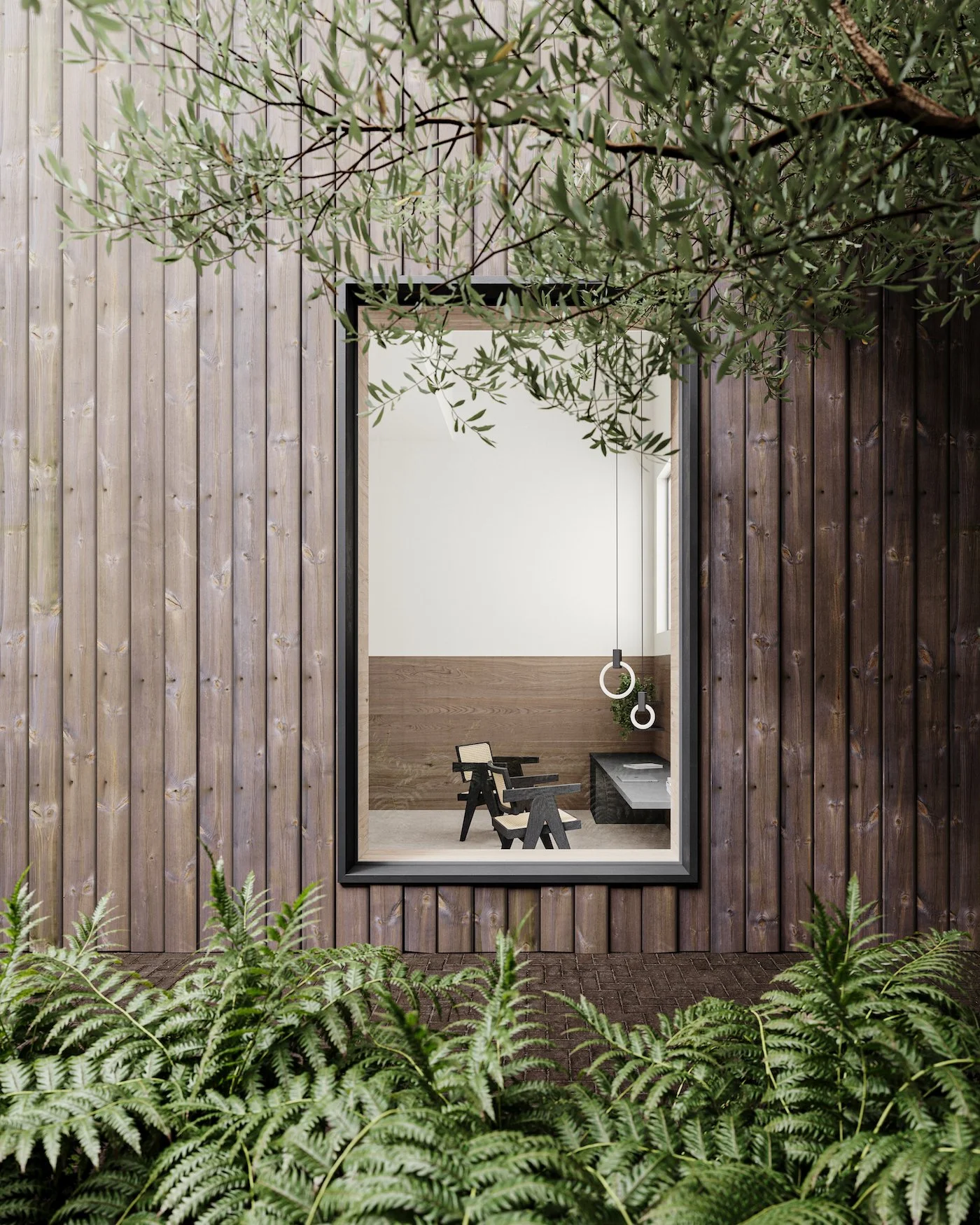 View of a modern room through a window, with a wooden wall outside, surrounded by green plants and foliage in the foreground.